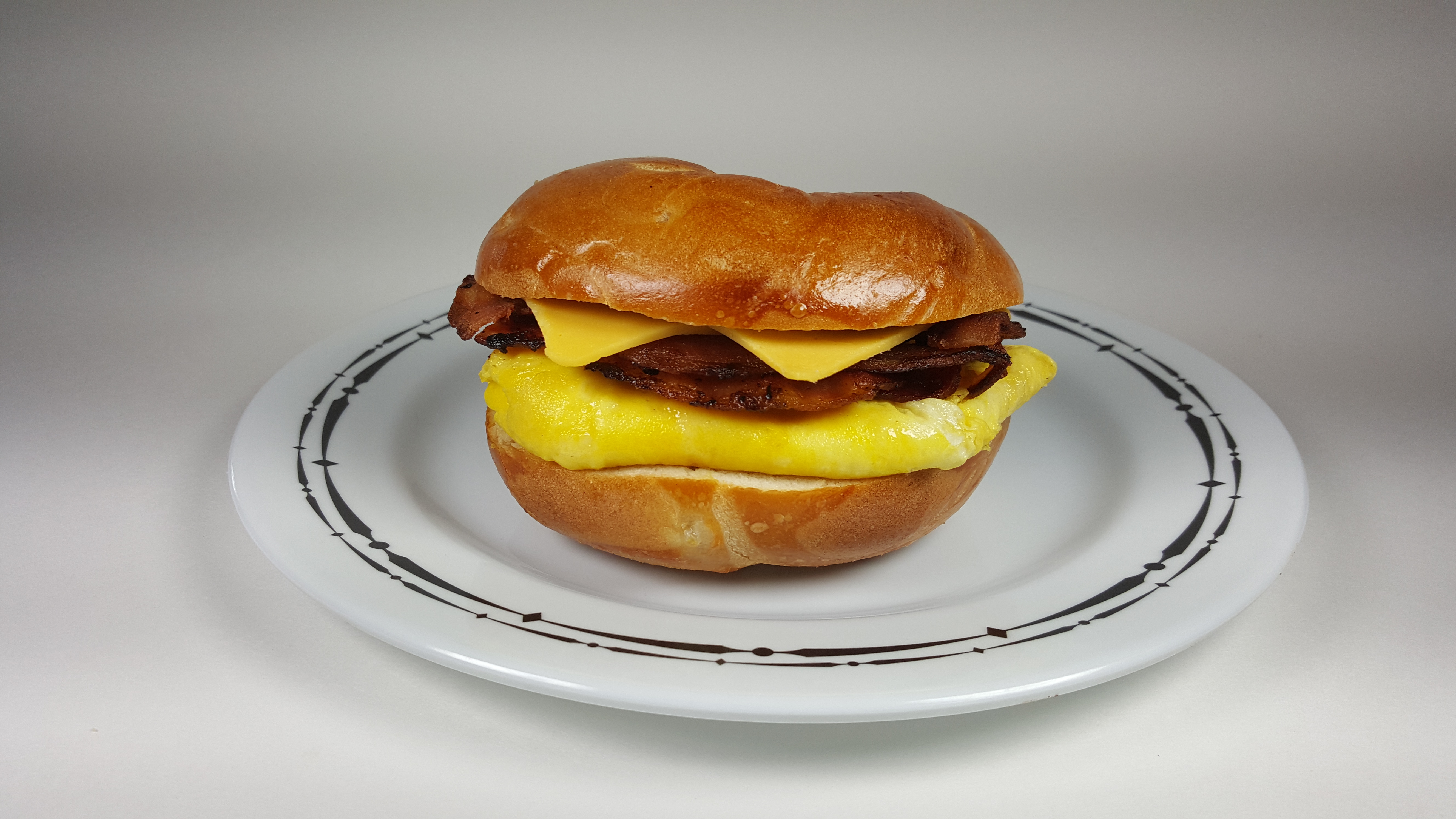 Order Egg on a Roll Sandwich food online from Pickles & Pies store, Rockaway Park on bringmethat.com