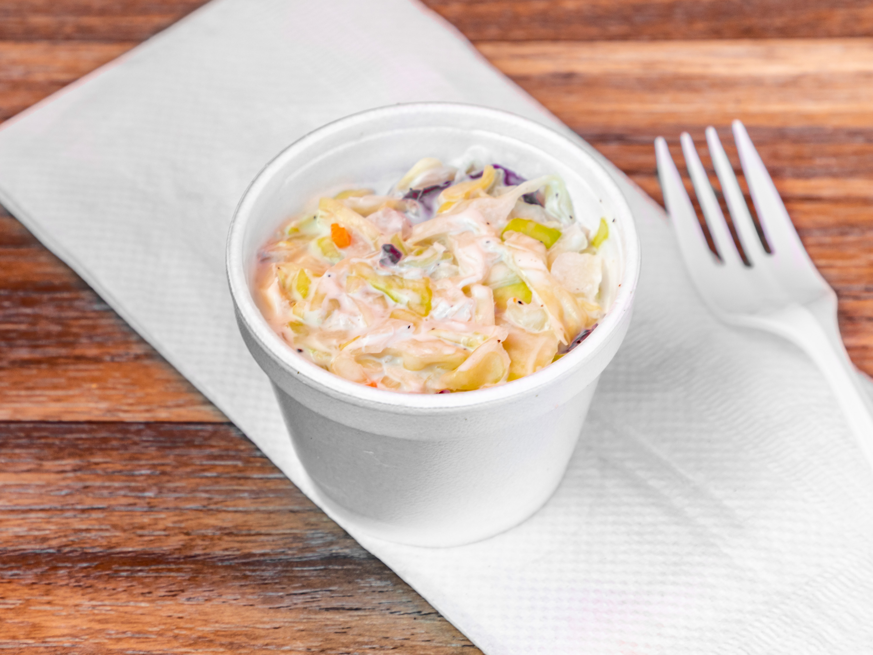 Order Coleslaw food online from Charlie Famous Fried Chicken store, Los Angeles on bringmethat.com