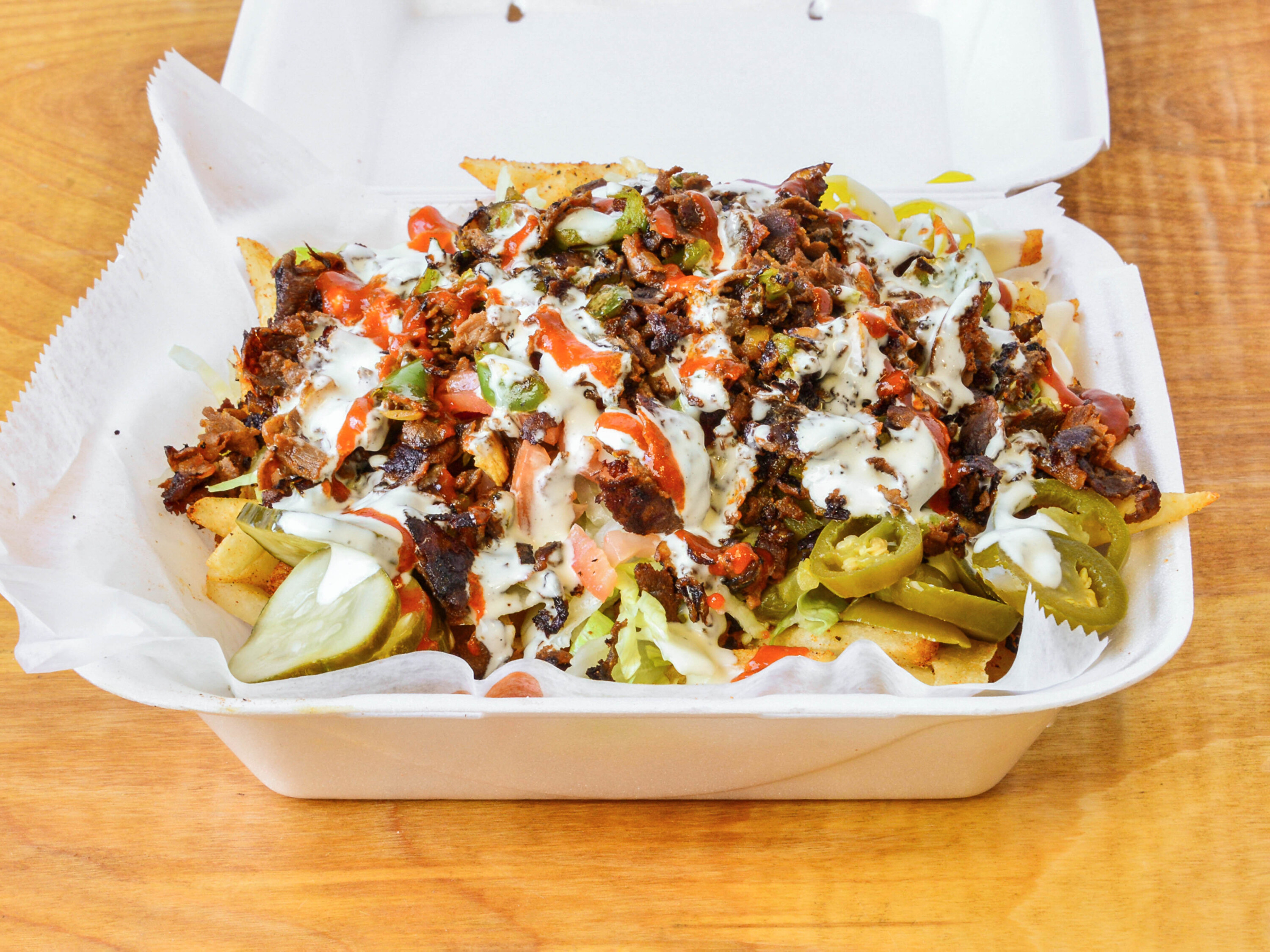 Order Loaded fries food online from Shottys Kitchen store, Detroit on bringmethat.com