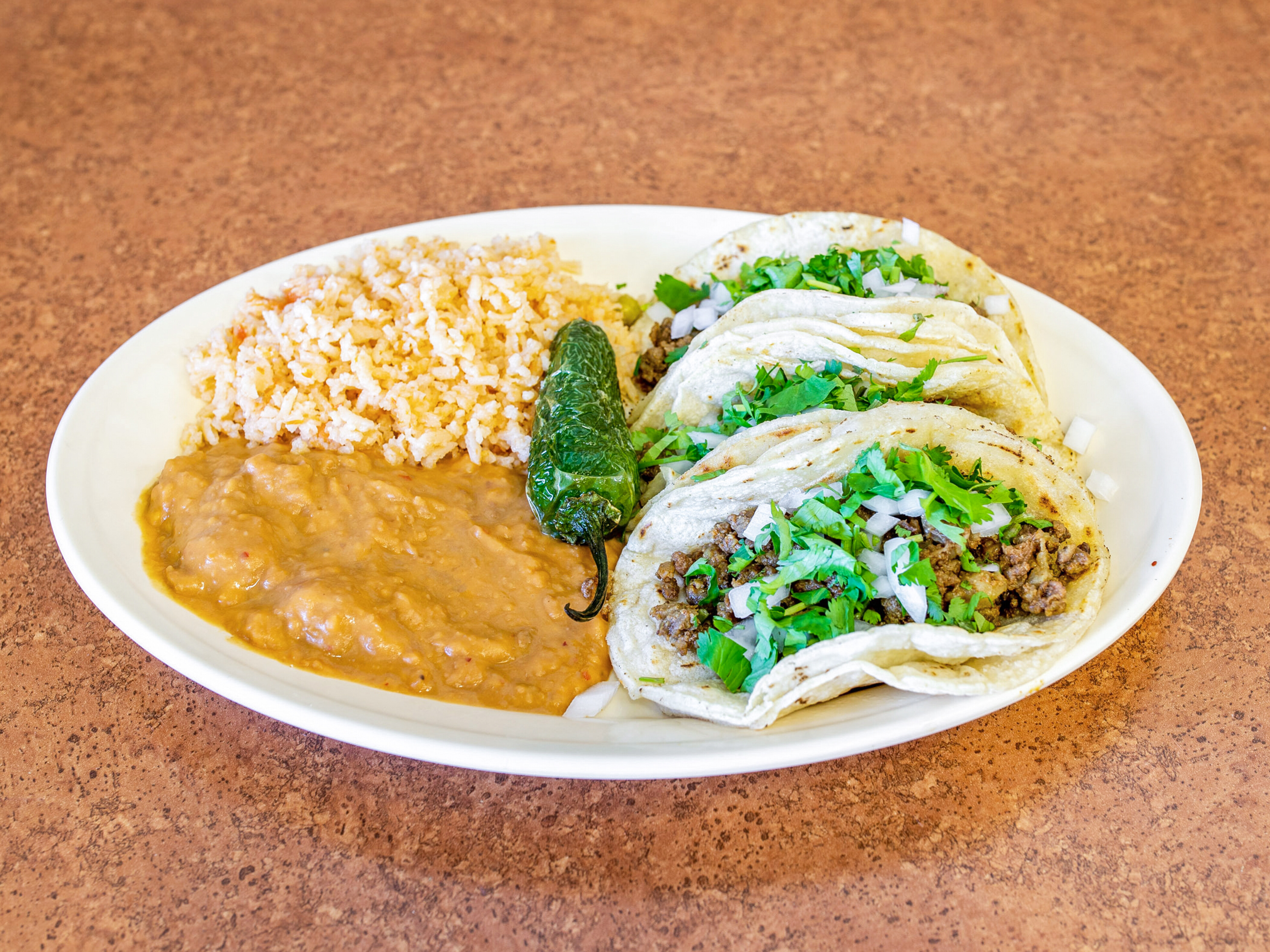 Order 3 Taco Dinner food online from Mr Burrito #2 store, Chicago Heights on bringmethat.com