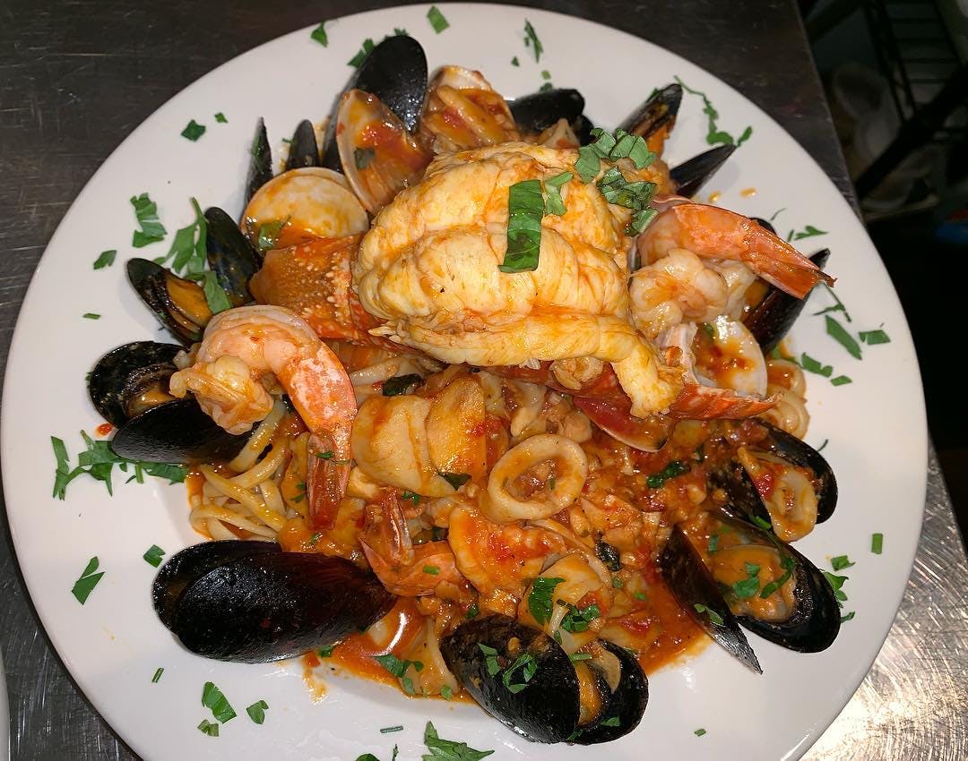 Order Zuppa Di Pesce - Entree food online from Nonna's Pizzeria store, Wappingers Falls on bringmethat.com