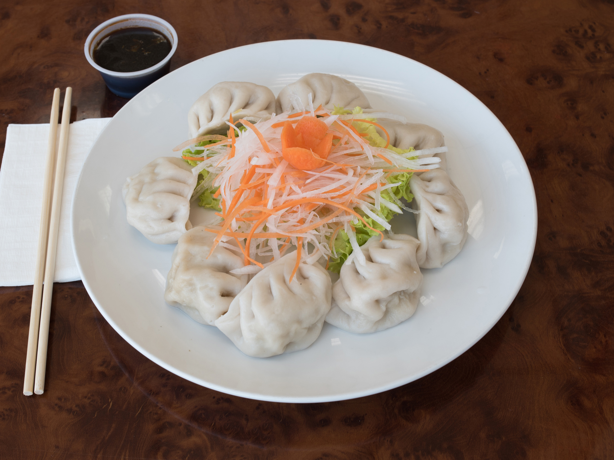 Order 13. Steamed Dumplings food online from Long River Chinese Restaurant store, Ozone Park on bringmethat.com