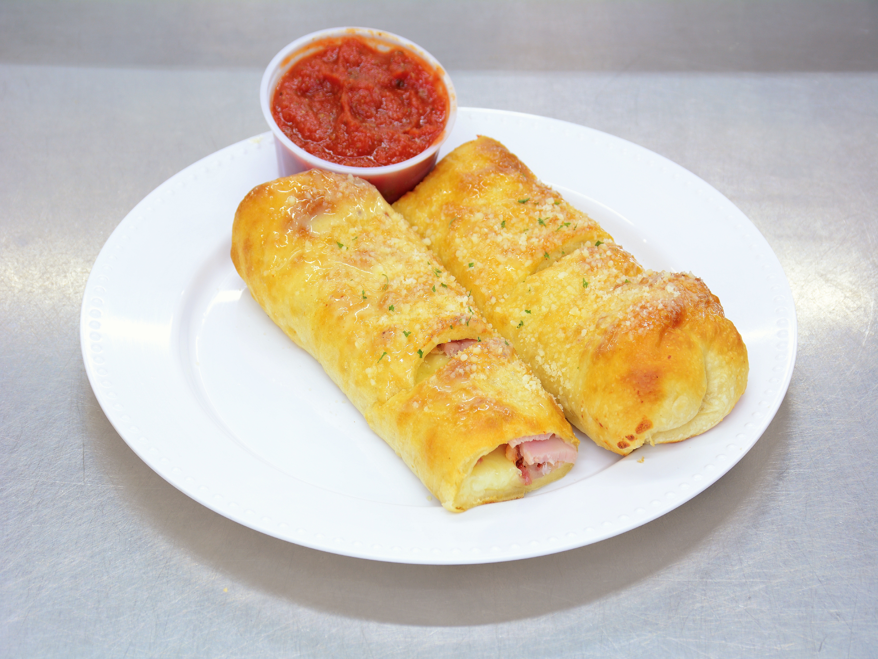 Order Specialty Stromboli food online from Ultimate Pizza store, Howell on bringmethat.com