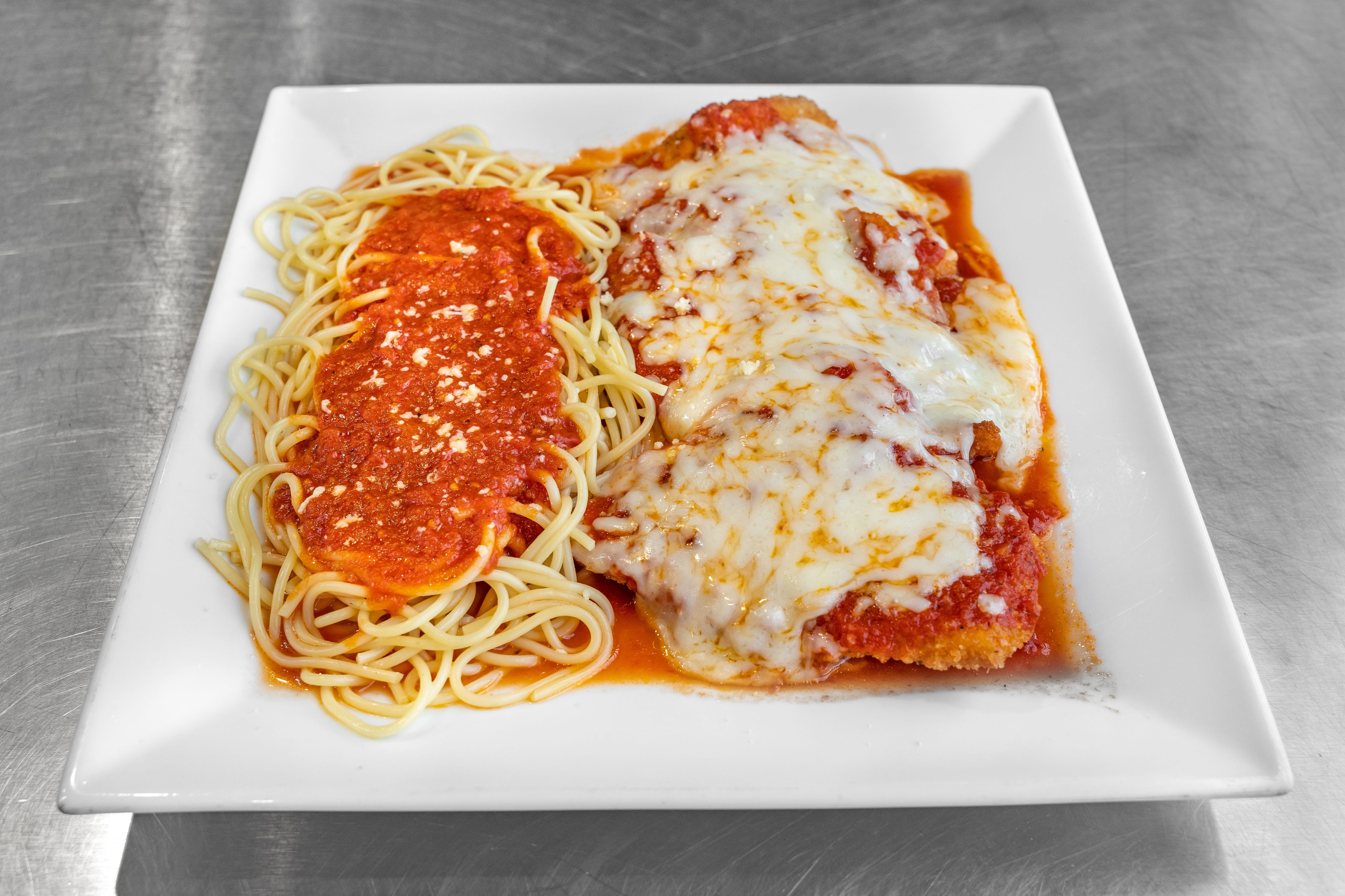 Order Chicken Parmigiana - Entree food online from Melrose East Restaurant & Pizza store, Southampton on bringmethat.com