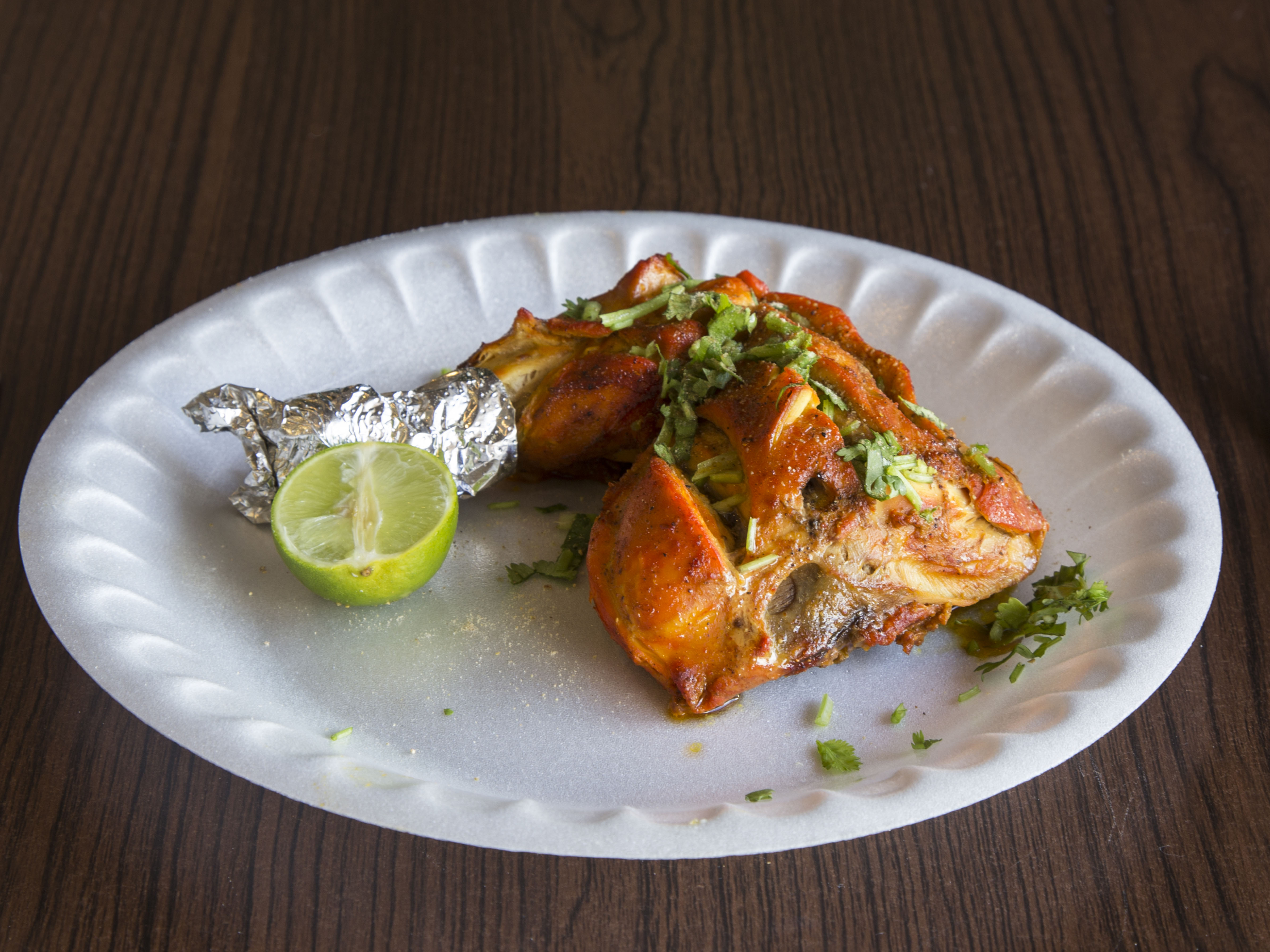 Order 1. Tandoori Chicken food online from Daawat Indian Cuisine store, Phoenix on bringmethat.com