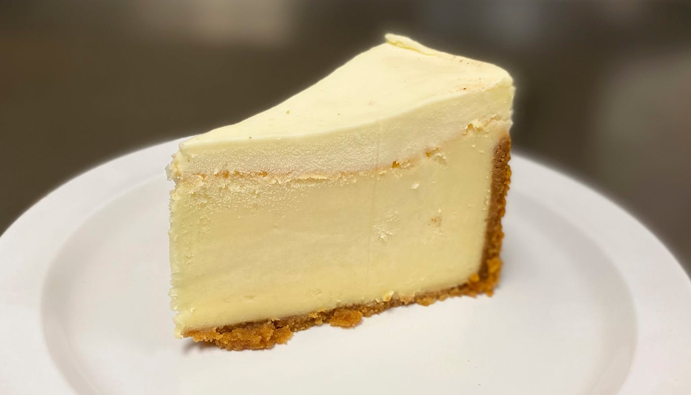 Order New York Colossal Cheesecake - Dessert food online from New York New York Pizza and Pasta store, La Mesa on bringmethat.com
