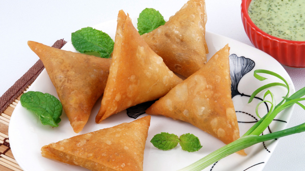 Order Onion Samosa food online from Cakes & Bakes store, Fremont on bringmethat.com