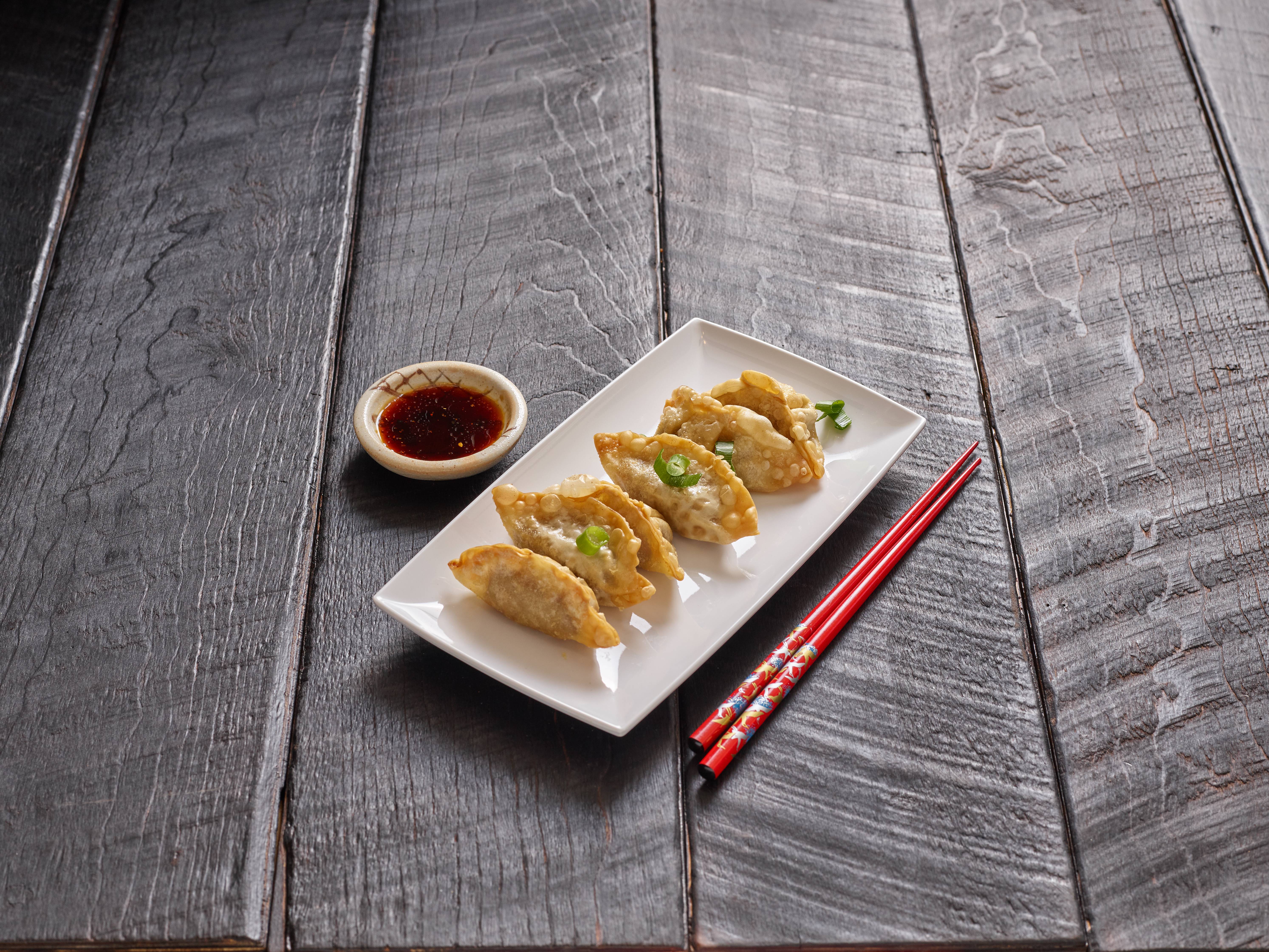 Order 6 Pieces Beef Gyoza food online from Sushi N Pop store, Fresno on bringmethat.com
