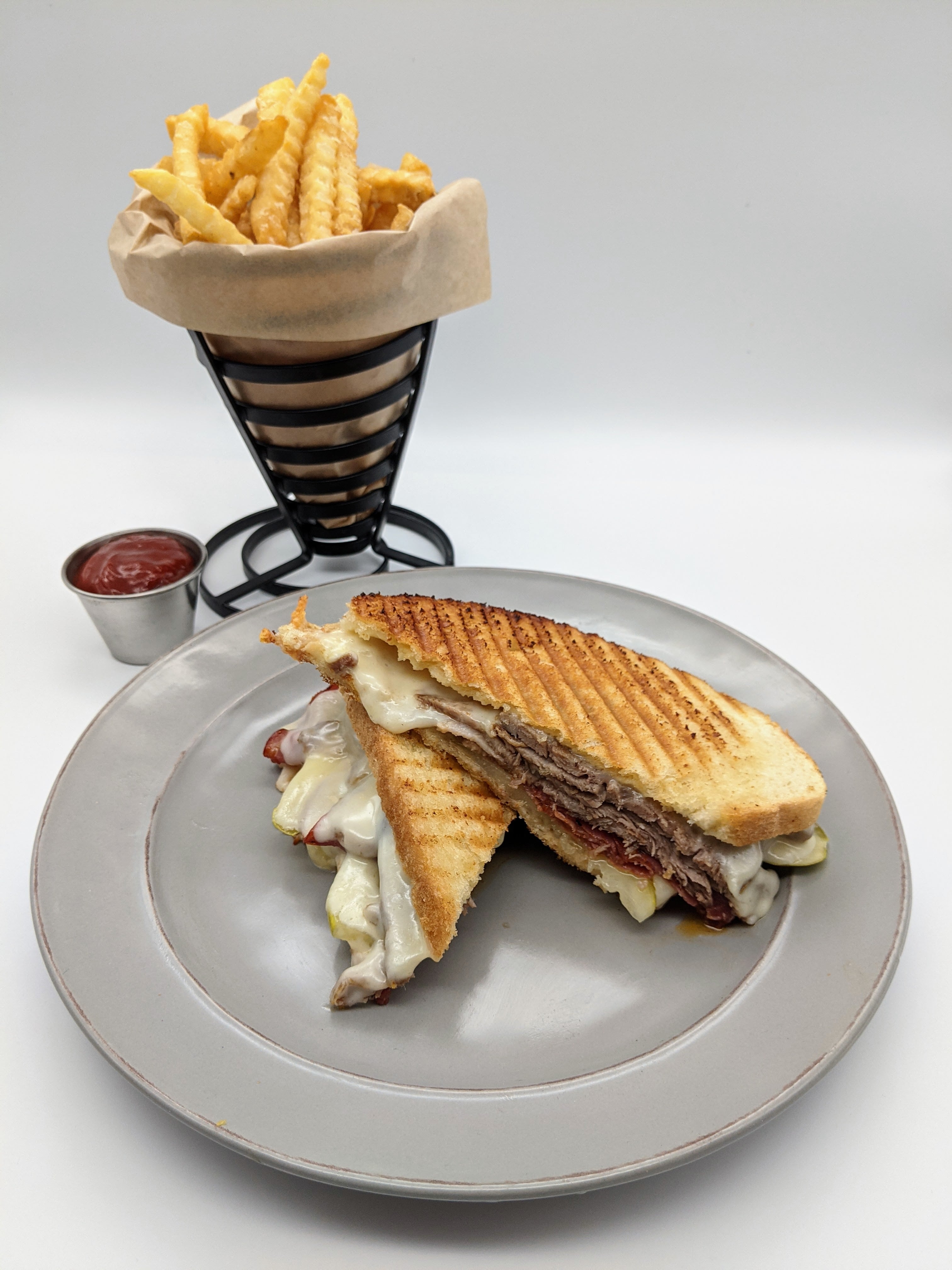 Order Cuban Sandwich - Half food online from Ithaca Ghost Kitchen store, Ithaca on bringmethat.com