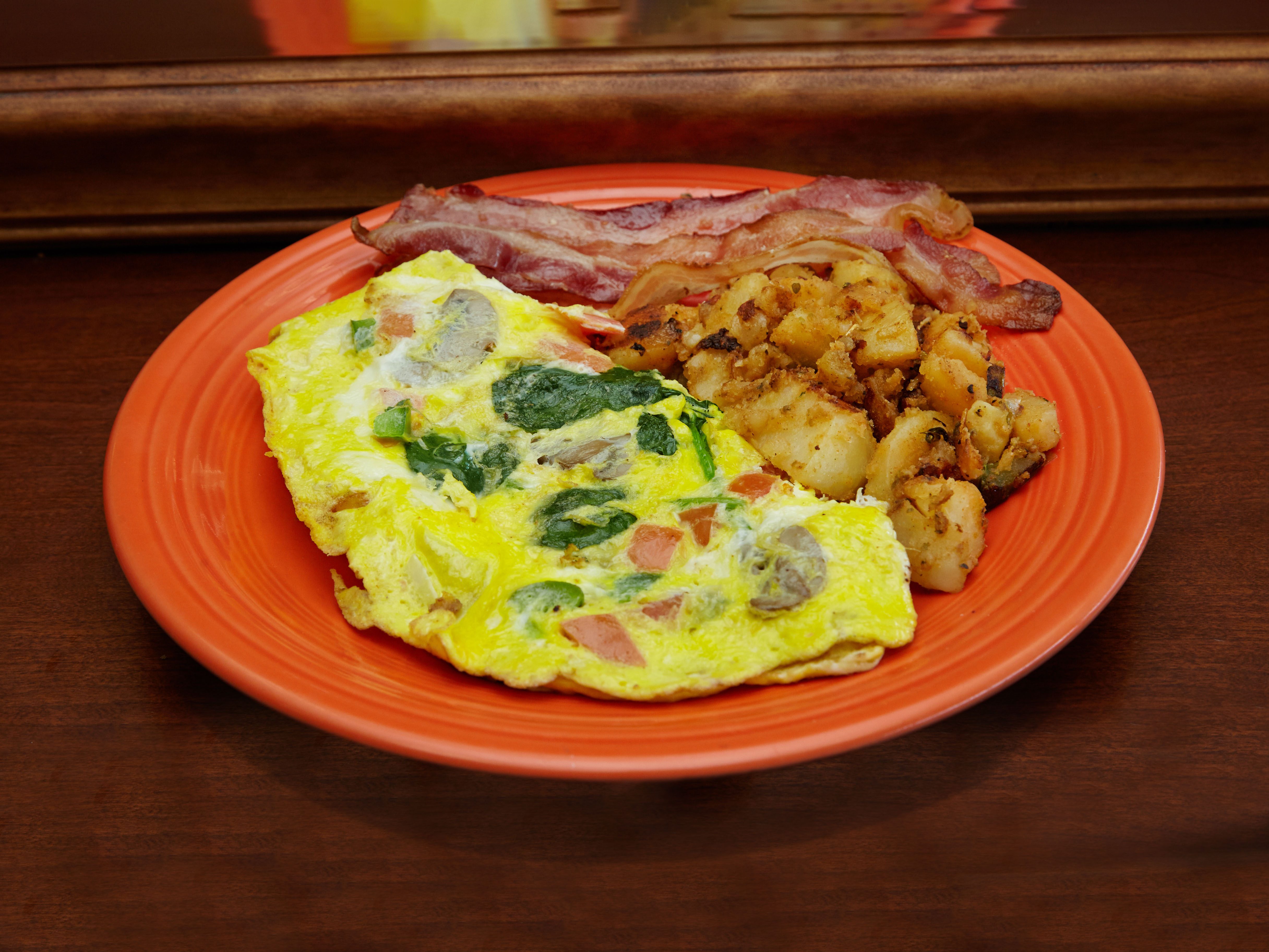 Order Garden Omelette on Plate food online from Bagels and brew store, Astoria on bringmethat.com