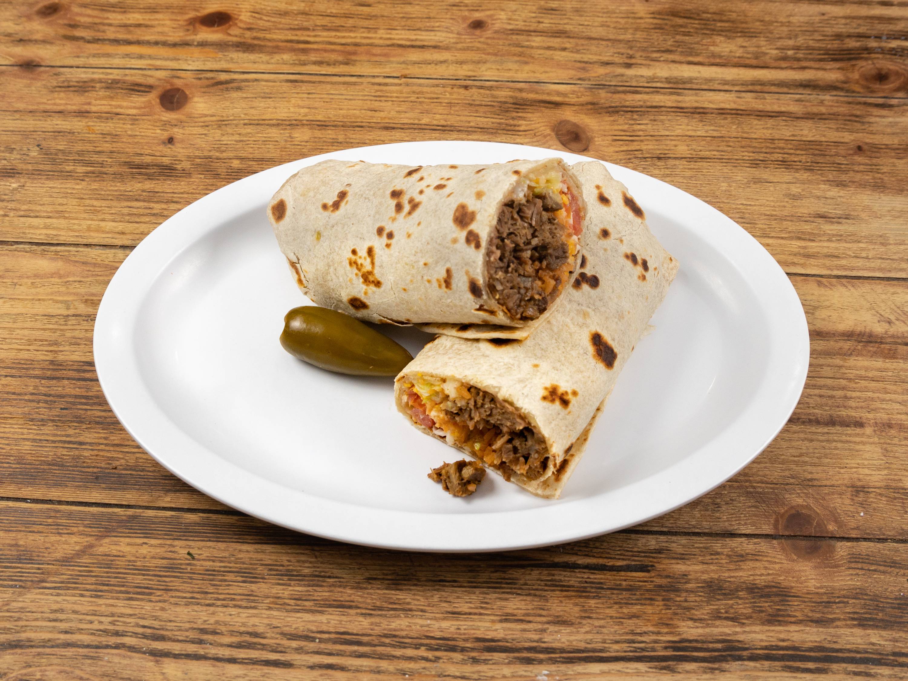 Order Bean and Cheese Burrito food online from Tacos Flores store, Atascocita on bringmethat.com