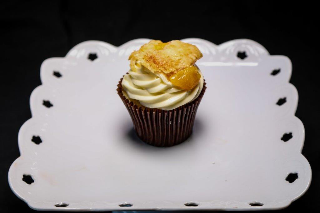 Order Peach Cobbler Surprise Cupcake food online from Sugar Rush Too store, Houston on bringmethat.com