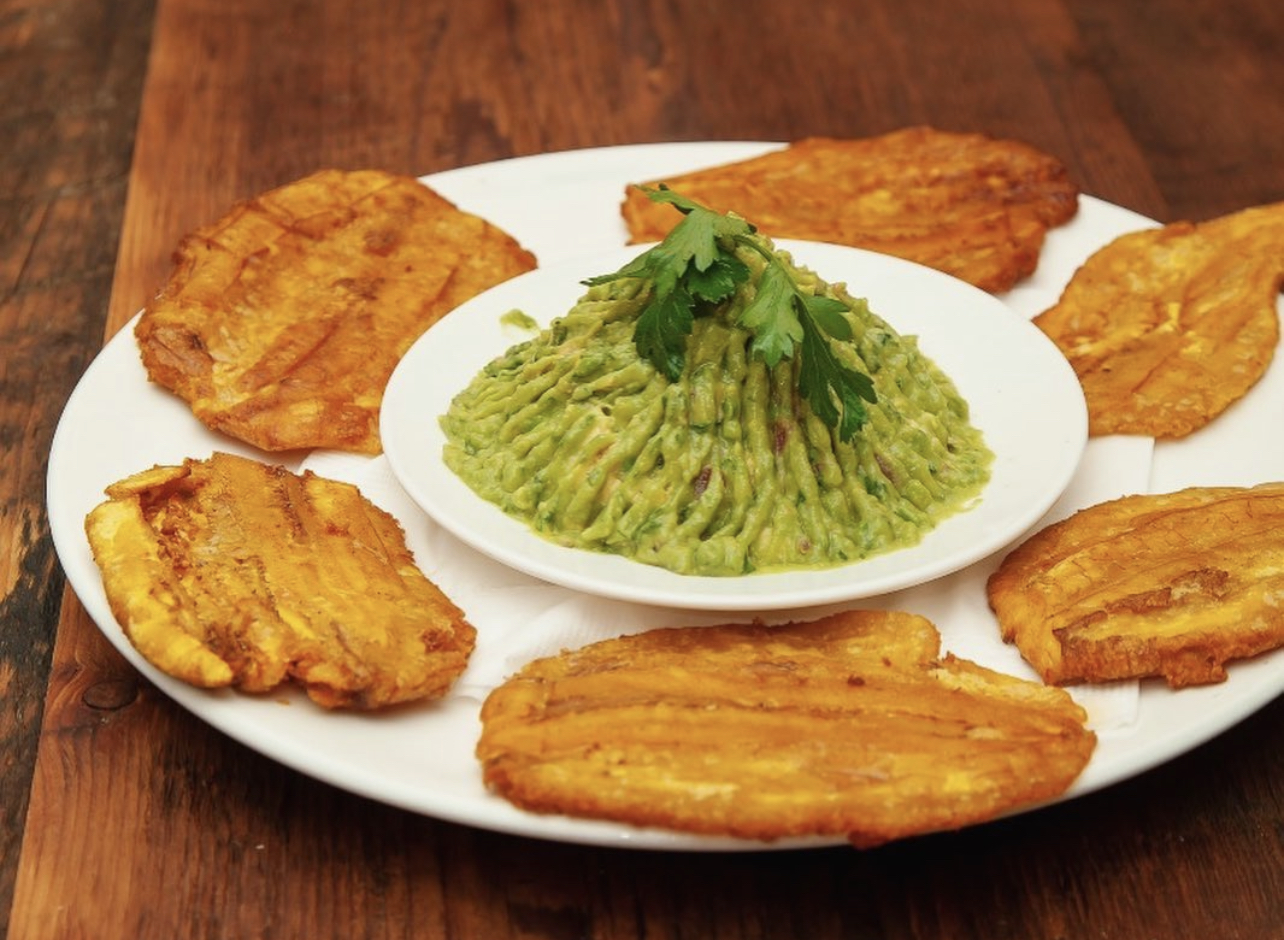 Order 6. Tostones con Guacamole / Green Plantains With Guacamole food online from Mr. Mario store, College Point on bringmethat.com