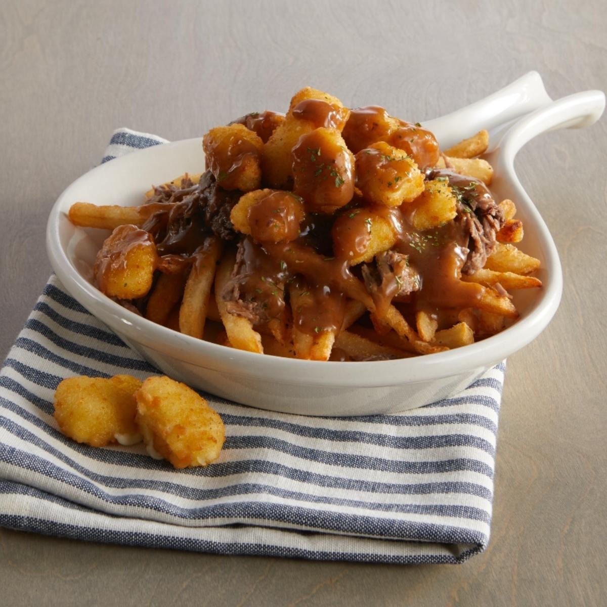 Order Poutine food online from Country Kitchen store, Dickinson on bringmethat.com