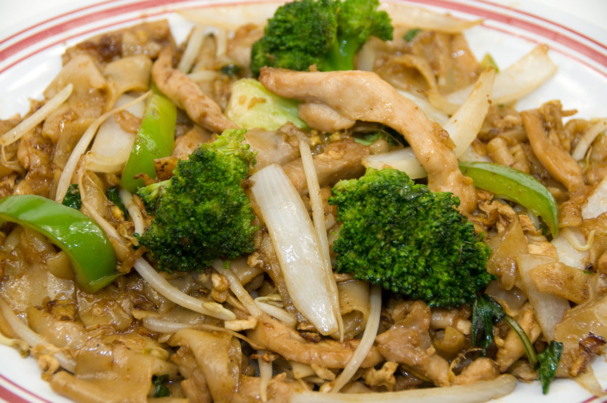 Order 23. Pad Kee Mow Chicken Noodle food online from Thai Basil Cuisine store, Berkeley on bringmethat.com