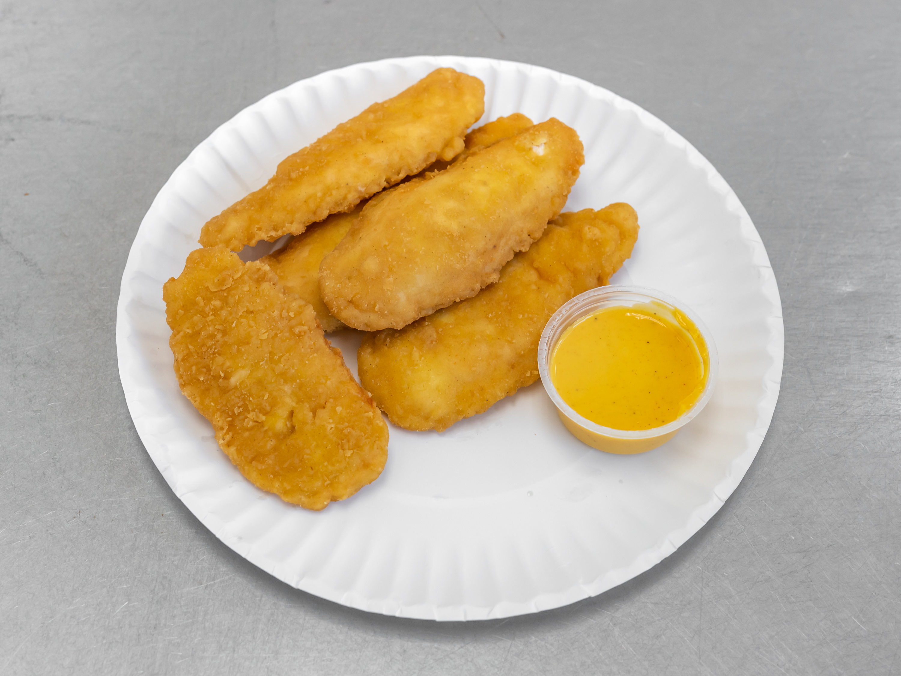 Order Chicken Tenders food online from Pizza Mart - 12th St. NE store, Washington on bringmethat.com