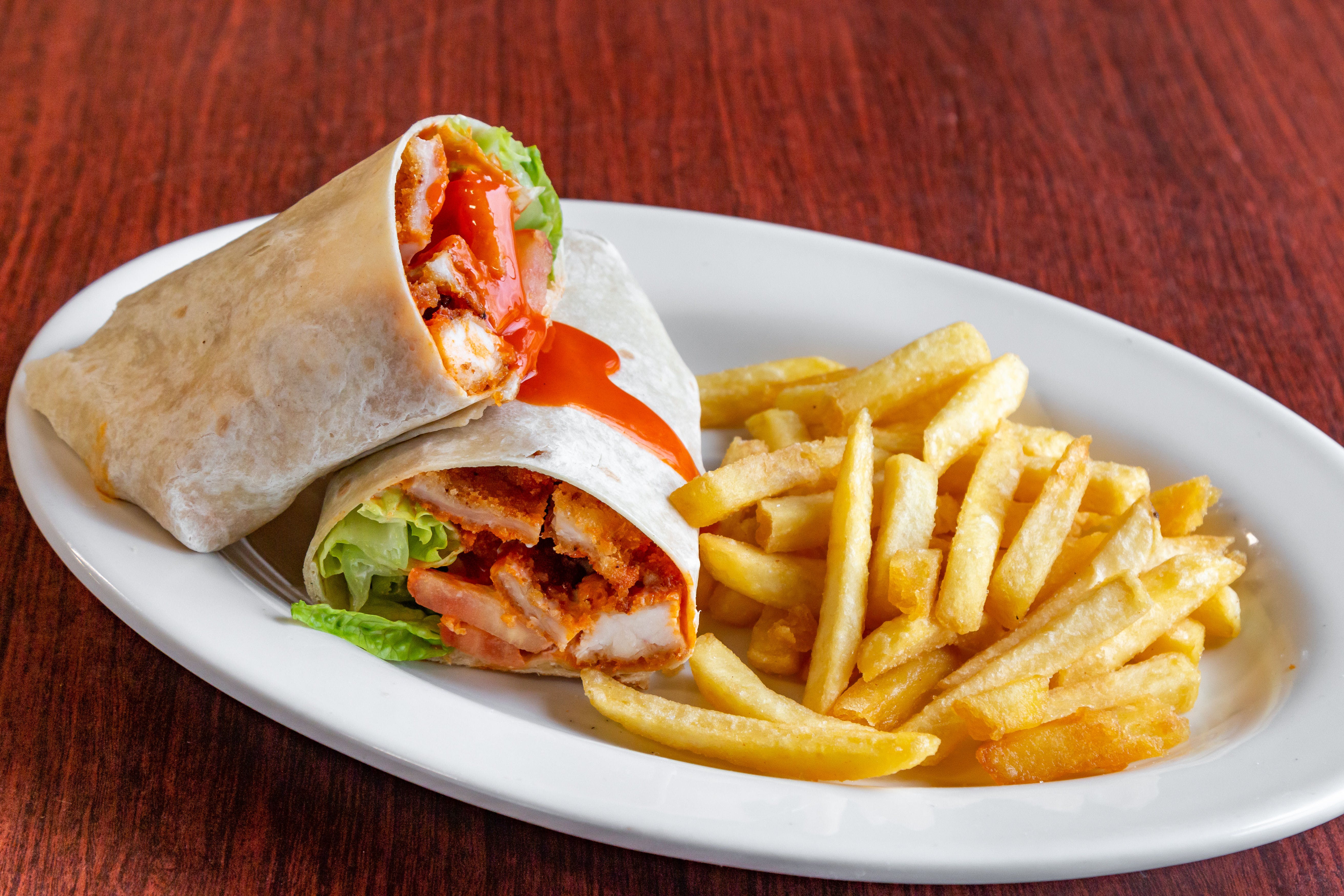 Order Crispy Buffalo Chicken Wrap - Wraps food online from Saybrook Pizza & Restaurant store, Old Saybrook on bringmethat.com