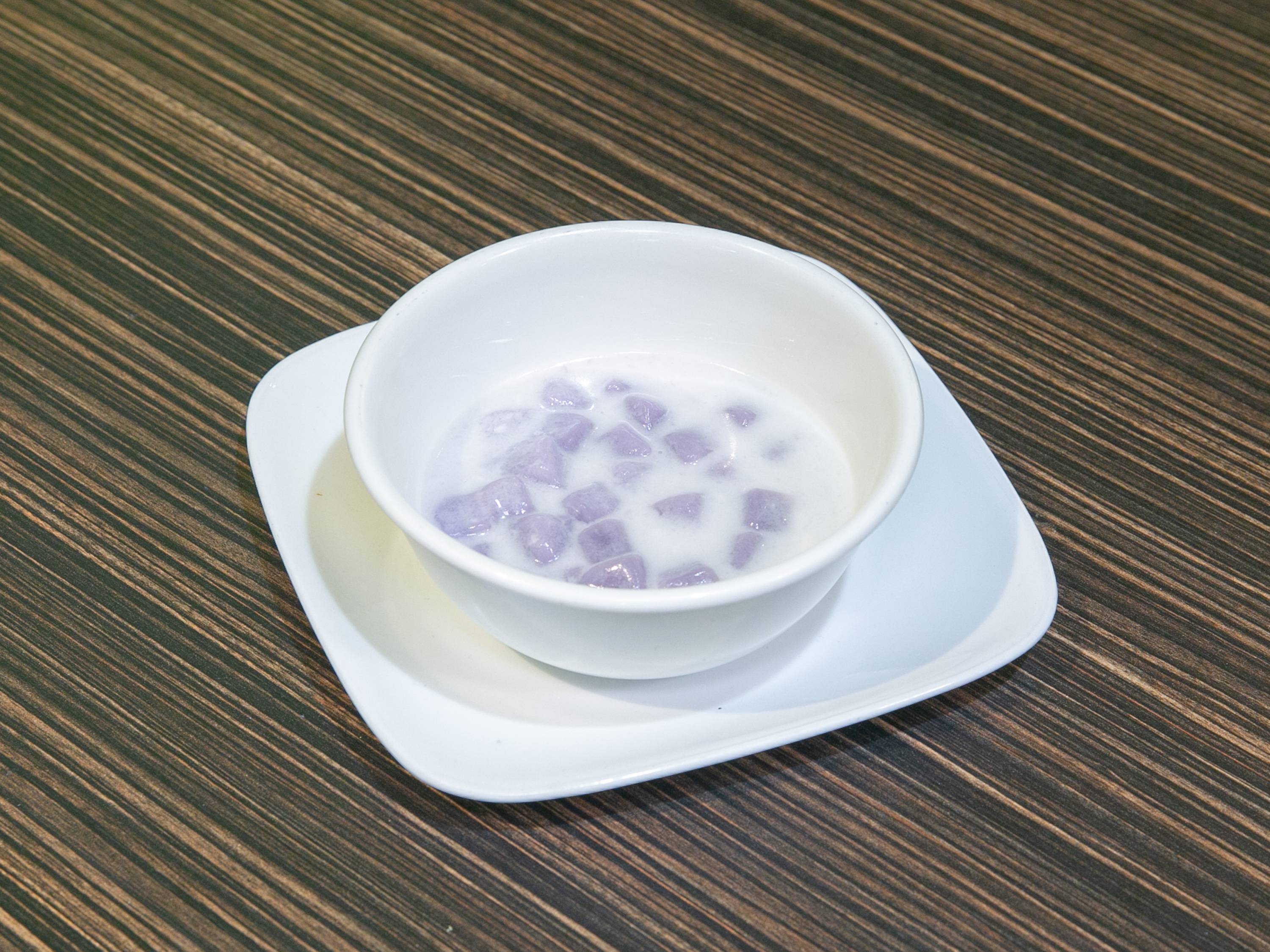 Order 74. Taro Pearl in Coconut Milk food online from The thai grill & noodle bar store, Chicago on bringmethat.com
