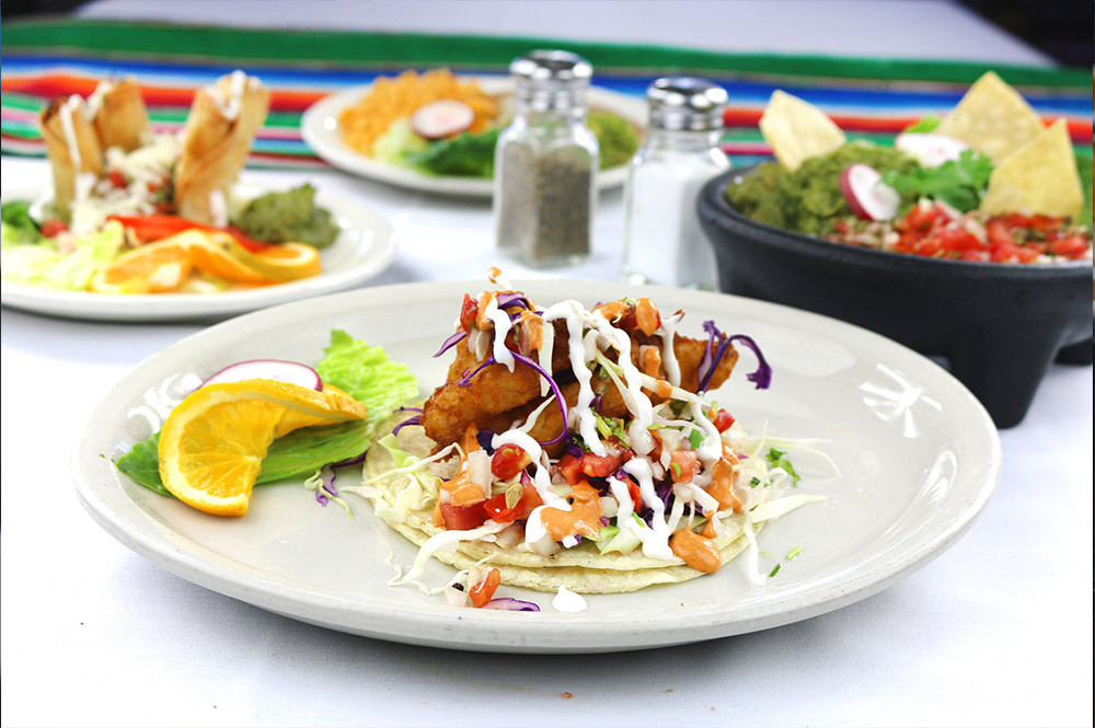 Order Baja Fish Taco food online from Fiesta Martin Tacos store, Inglewood on bringmethat.com