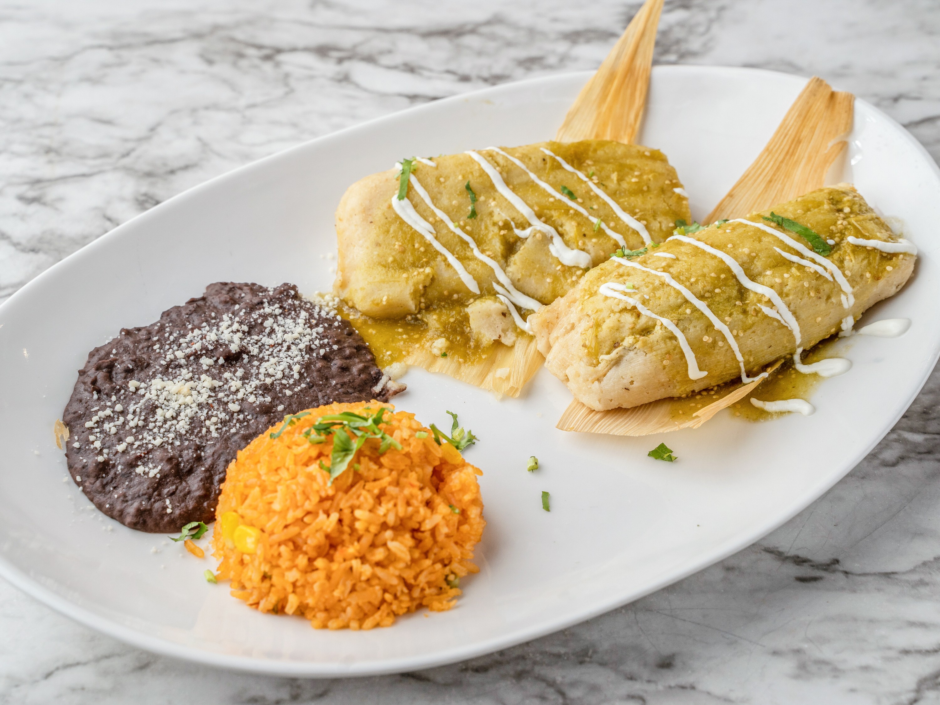 Order 2 Piece Tamales Jalisco food online from Zocalo Street Food | Tequila store, Wilmington on bringmethat.com