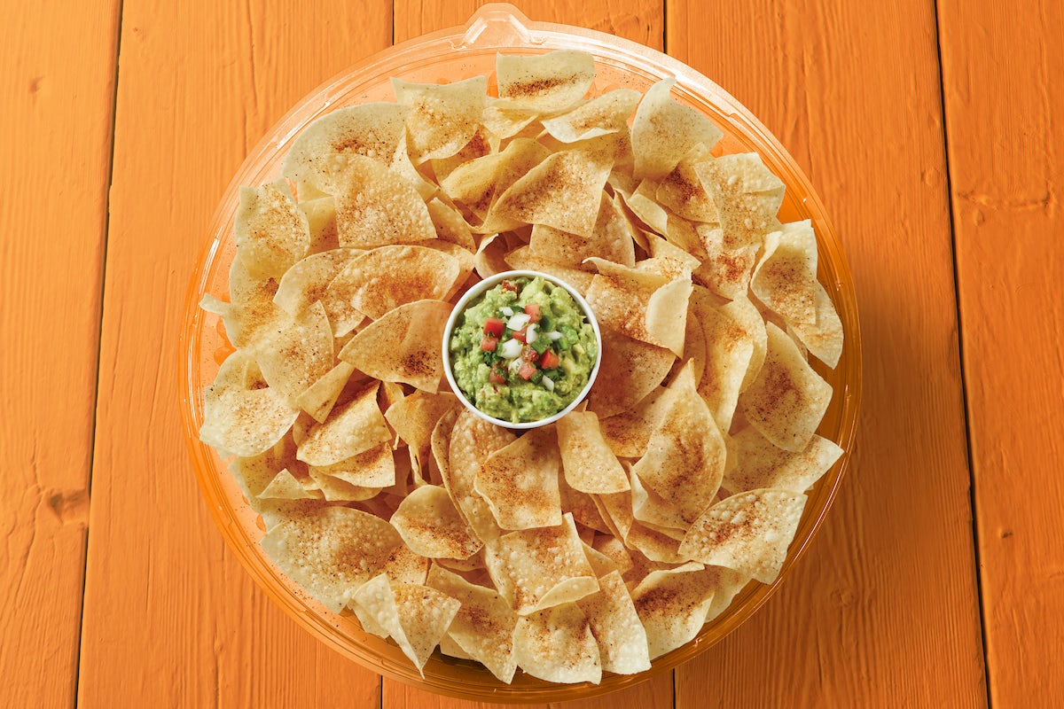 Order Chips & Guacamole Party Tray food online from Fuzzy Taco Shop store, Rogers on bringmethat.com