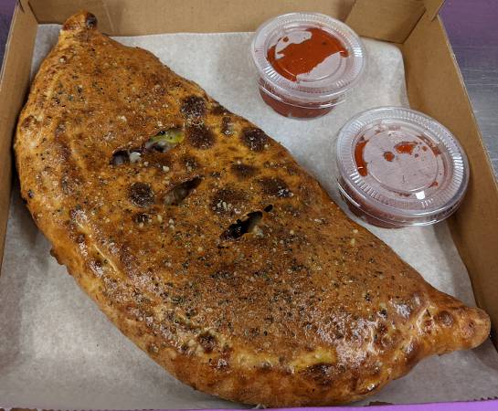 Order Specialty Calzone food online from Magpies Gourmet Pizza store, Tucson on bringmethat.com