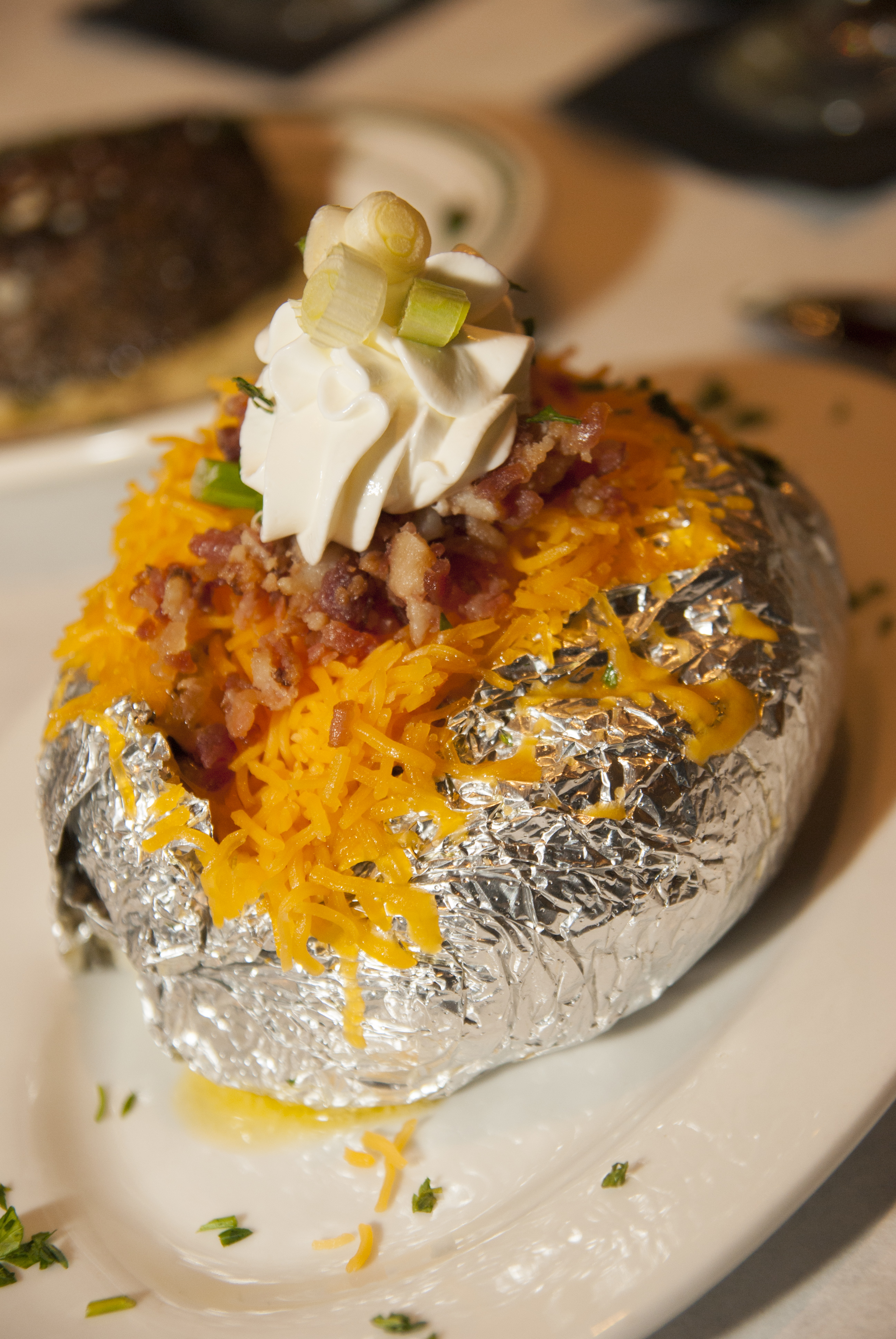 Order Baked Potato food online from The Palms Too store, Arabi on bringmethat.com