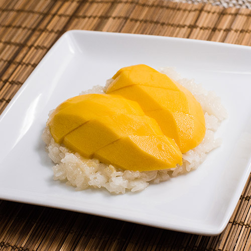 Order 50.Mango Sticky Rice food online from Garnjana Thai Restaurant store, Fredericksburg on bringmethat.com