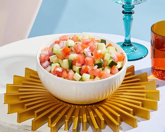 Order Israeli Salad food online from Chuck Cheesesteaks store, Malvern on bringmethat.com