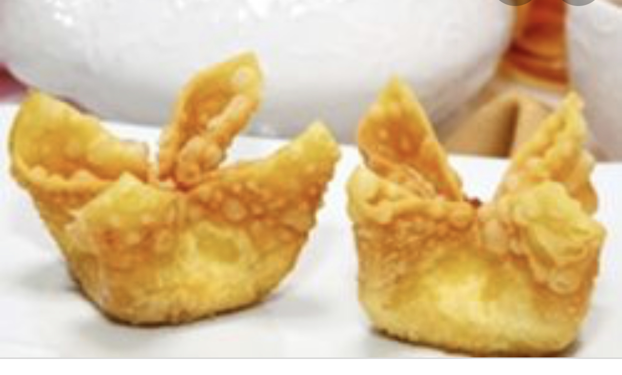 Order 6 Piece Crab Rangoon food online from China Inn store, Gainesville on bringmethat.com