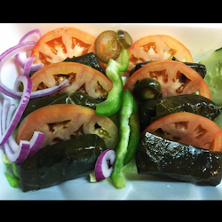 Order 6 Stuffed Grape Leaves food online from Husky Pizza store, Manchester on bringmethat.com