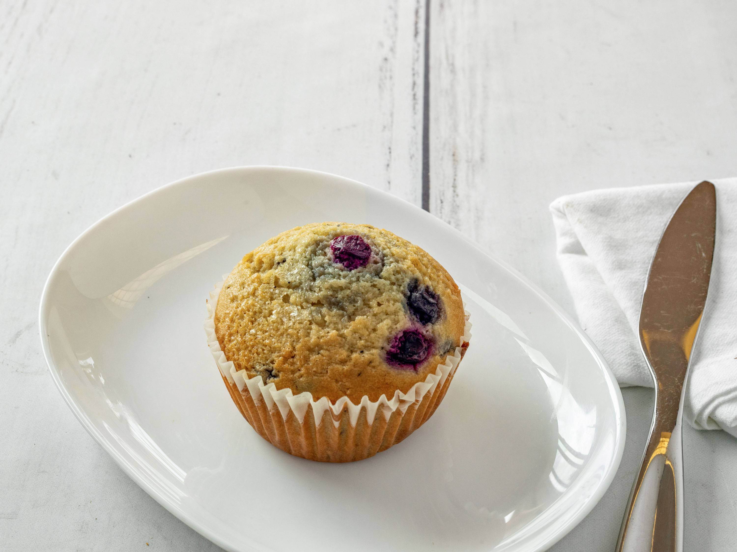 Order Blueberry Muffin food online from Fat Ducks Deli & Bakery store, Seattle on bringmethat.com