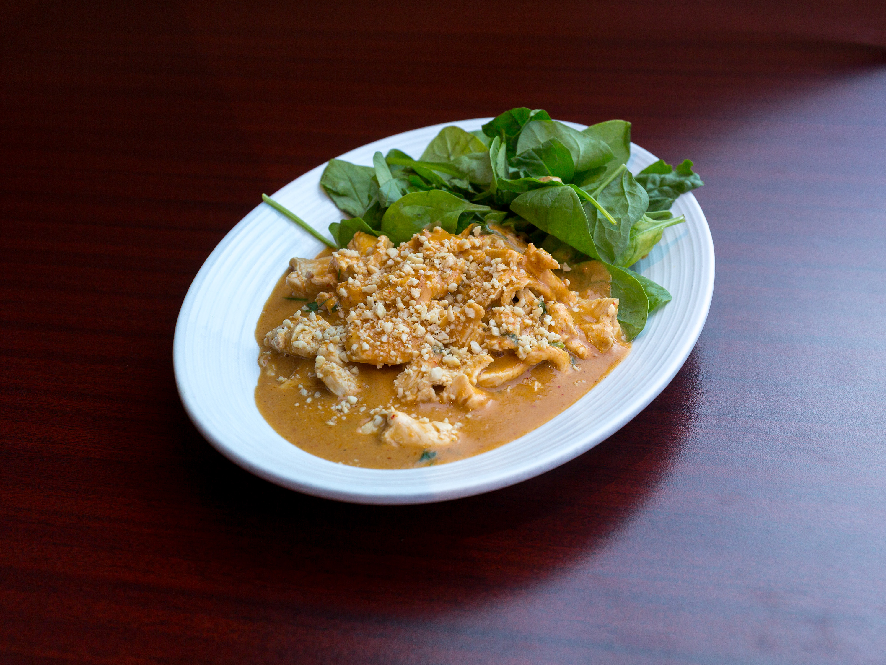 Order Spicy Peanut Chicken food online from The Spice Thai Cuisine store, Ames on bringmethat.com