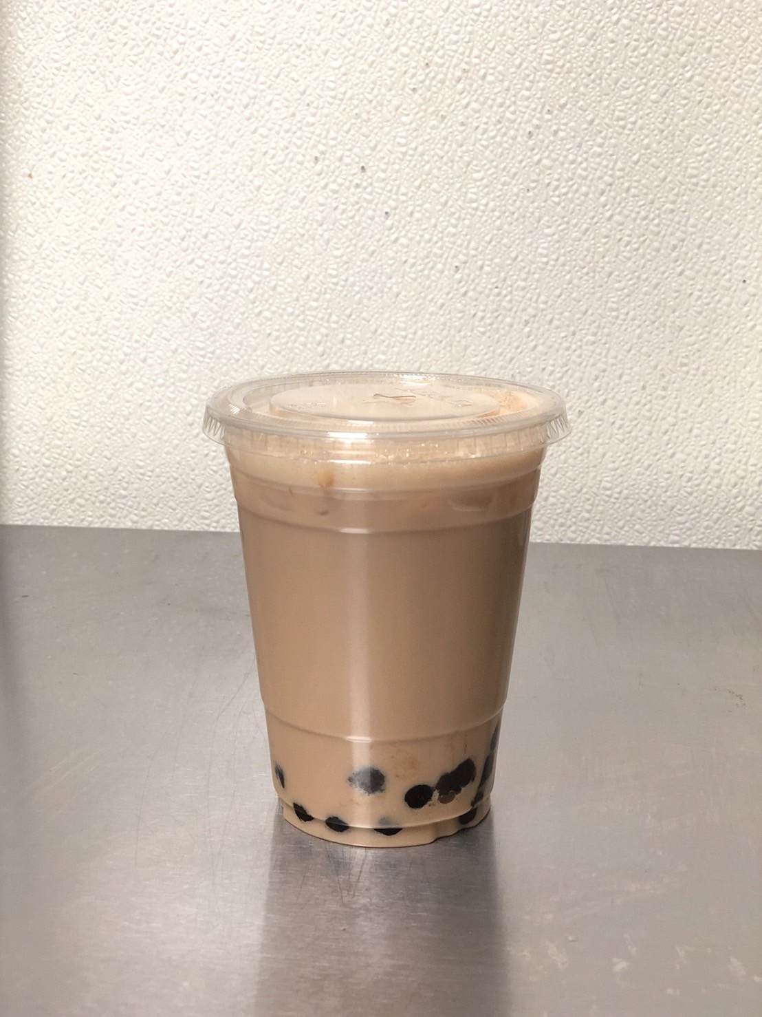 Order Iced Milk Tea food online from Sirinan Thai&Japanese Restaurant store, Wallingford on bringmethat.com