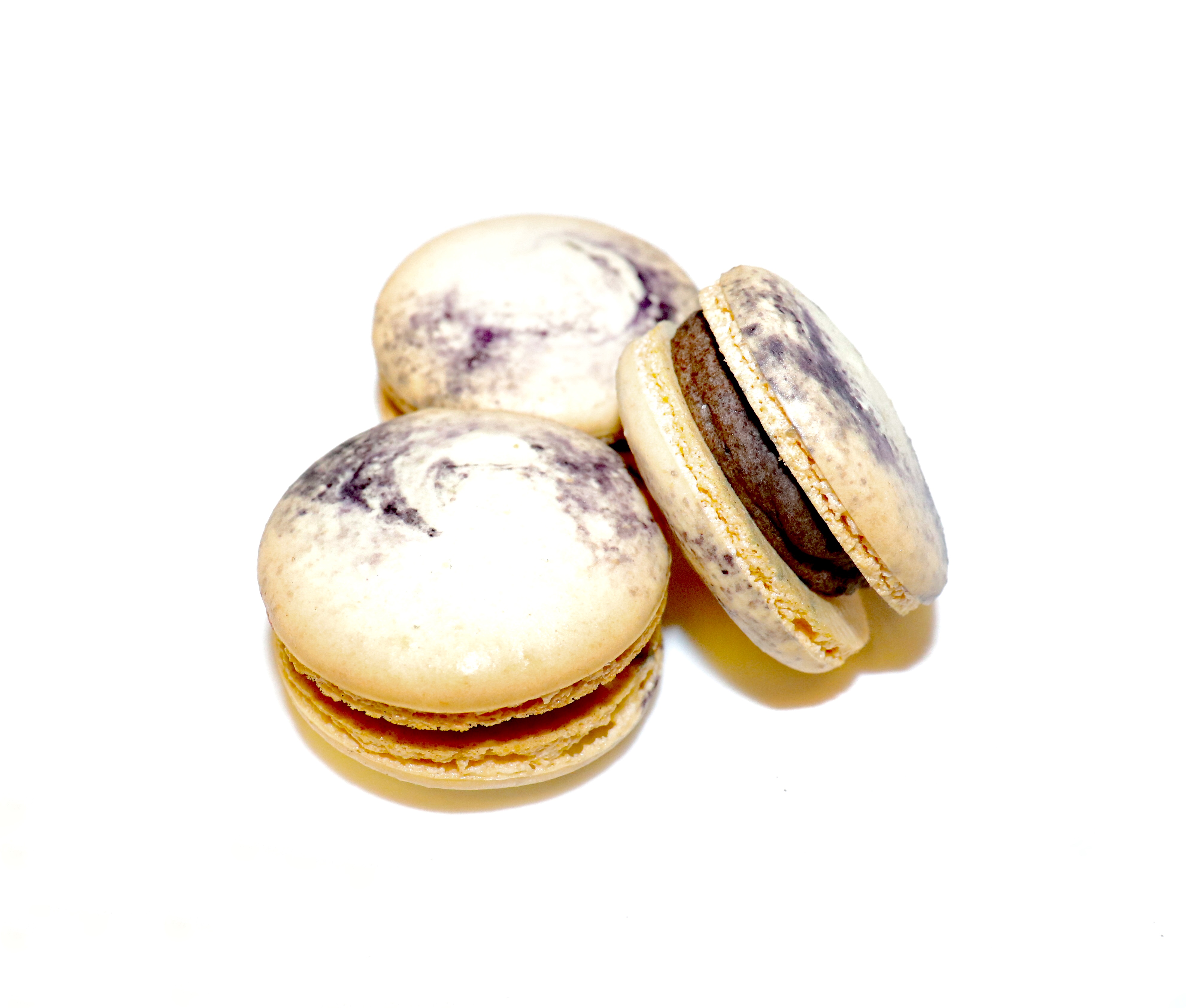 Order Cookies and Cream Macaron food online from Gotcha Tea store, San Diego on bringmethat.com