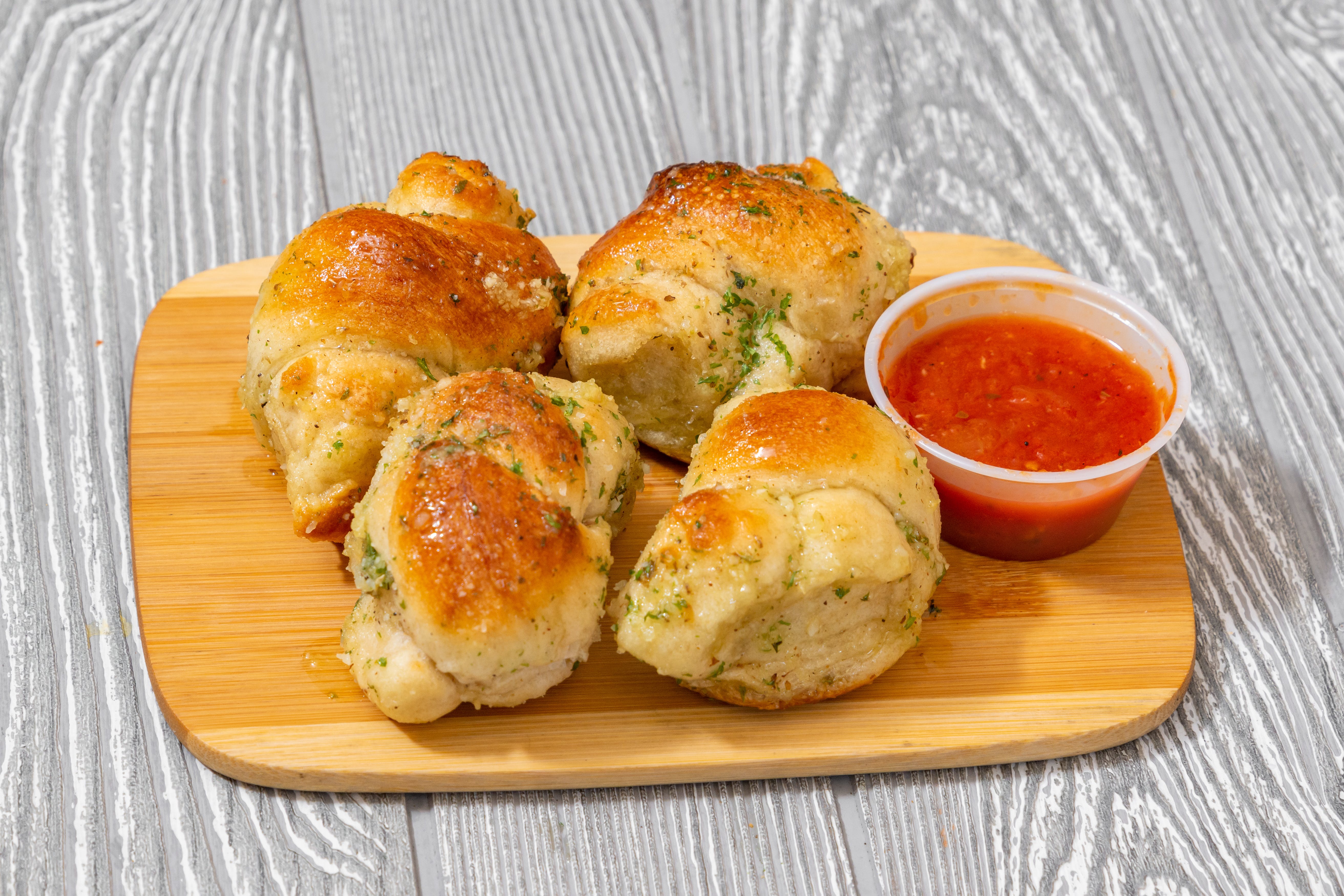 Order Garlic Knots - 4 Pieces food online from Bravo Pizza store, Avondale on bringmethat.com