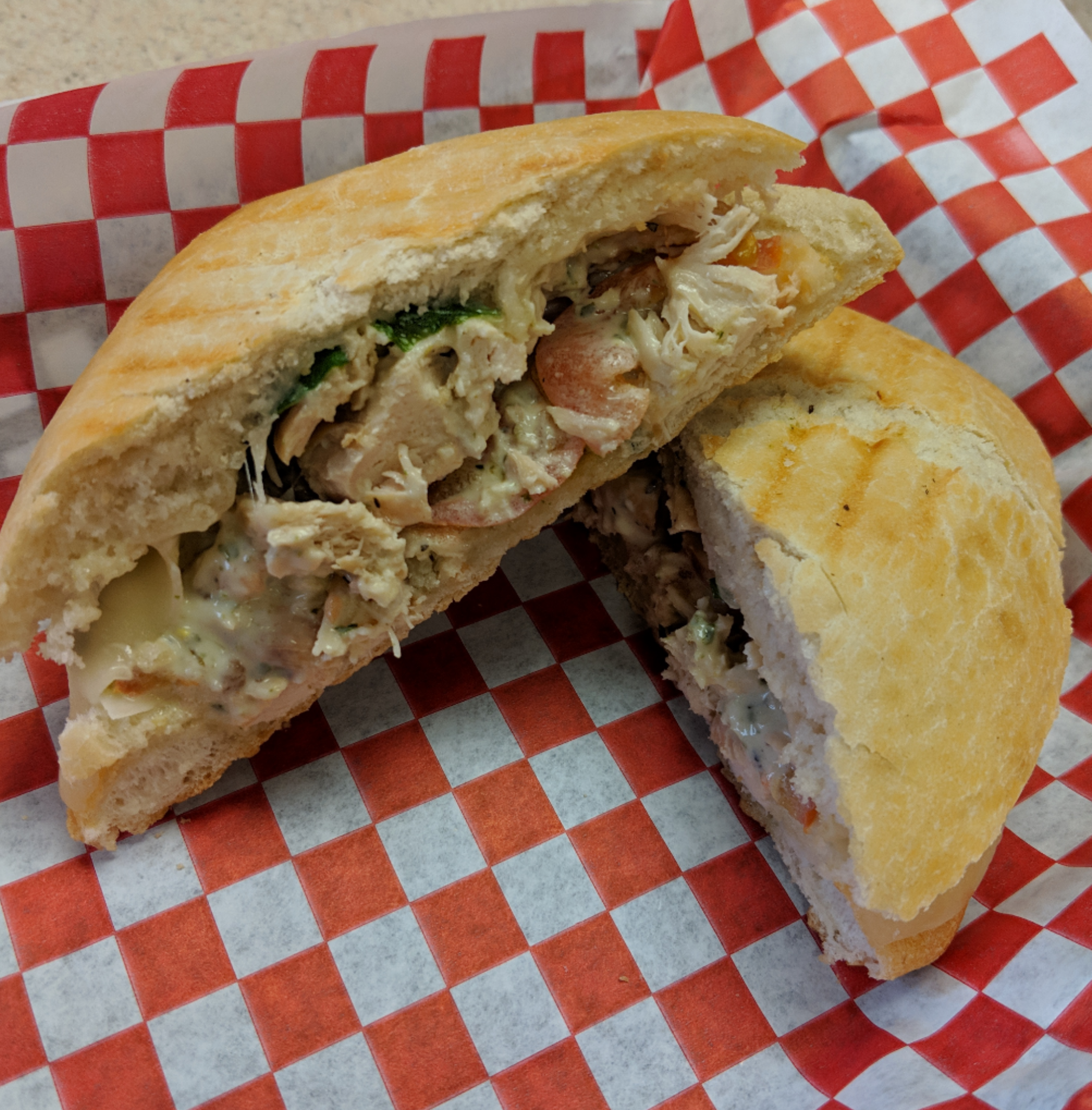Order Chicken Caprese Panini food online from Marco Polo Cheesesteaks store, New Braunfels on bringmethat.com