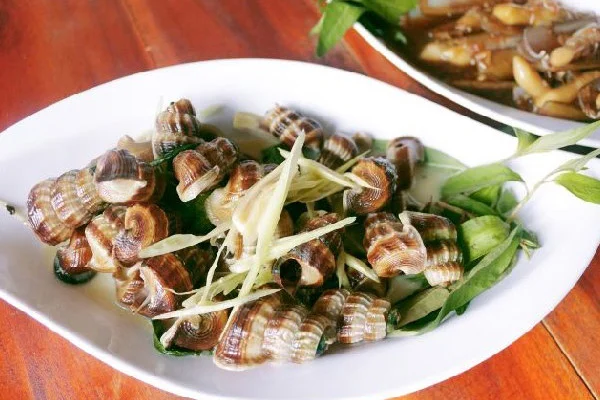 Order S15. Snail with Coconut Milk/ Oc Len Xao Dua food online from Max Saigon store, Chandler on bringmethat.com