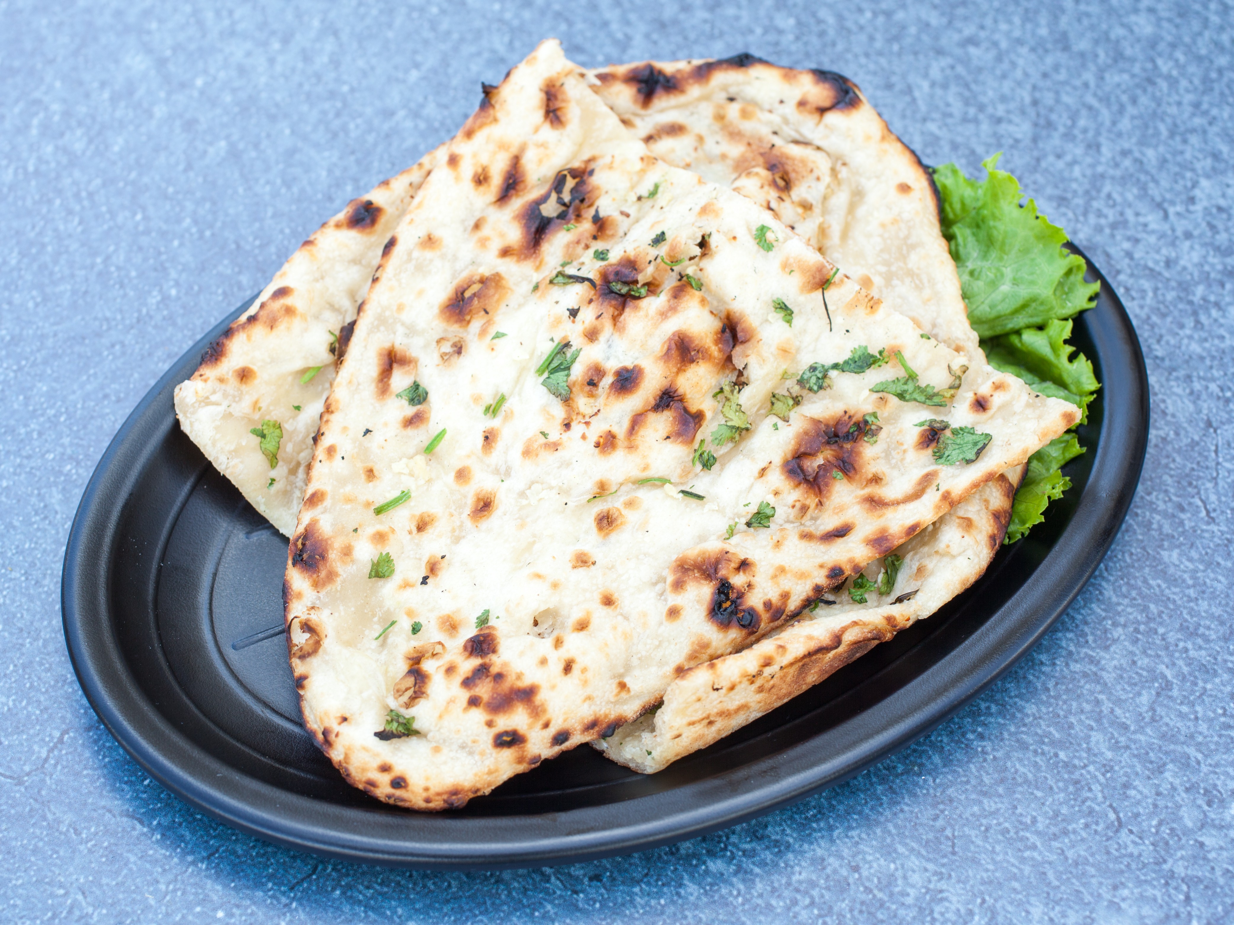 Order Naan food online from Mantra Indian Cuisine and Banquet store, Corona on bringmethat.com