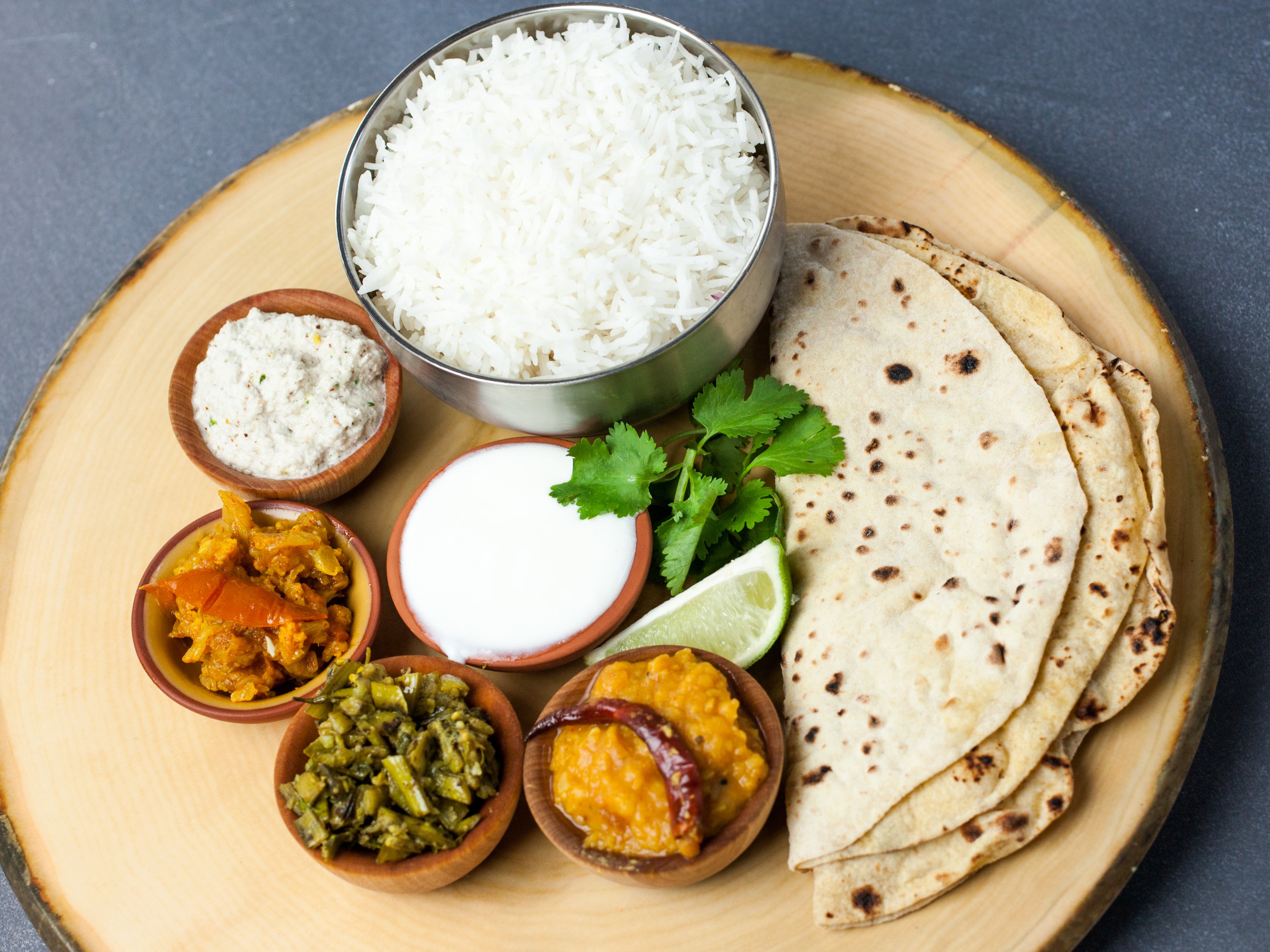 Order Thali with Roti food online from Ganeh Dosa House store, Jersey City on bringmethat.com