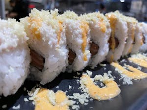 Order Salmon Lover Roll food online from Aki Sushi & Japanese Fusion store, San Jacinto on bringmethat.com