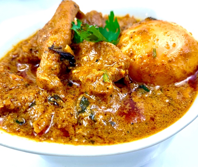 Order Dum Ka Chicken curry with Egg food online from Mainland India Restaurant store, Niles on bringmethat.com
