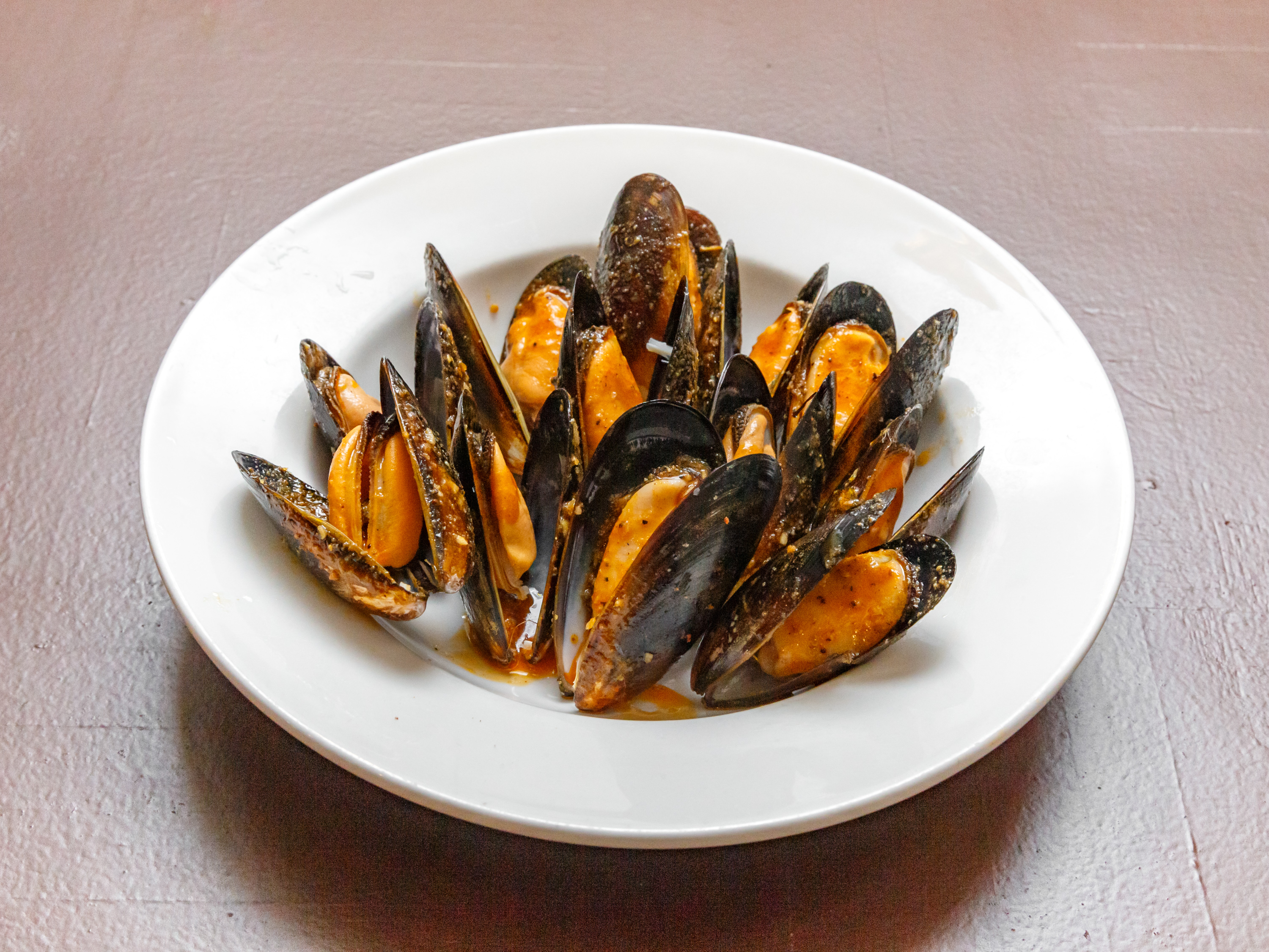 Order C8. 1/2 LB Black Mussels  food online from Ocean Treasures store, Pittsburgh on bringmethat.com