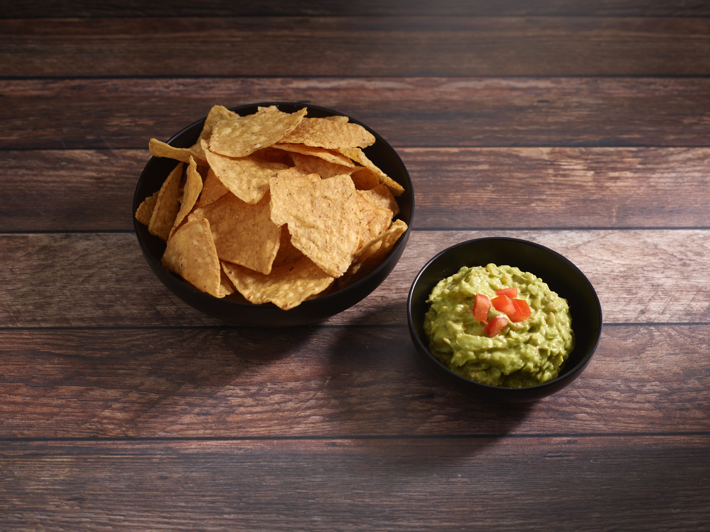 Order Chips and Guacamole food online from Mariachi Taquito store, New York on bringmethat.com