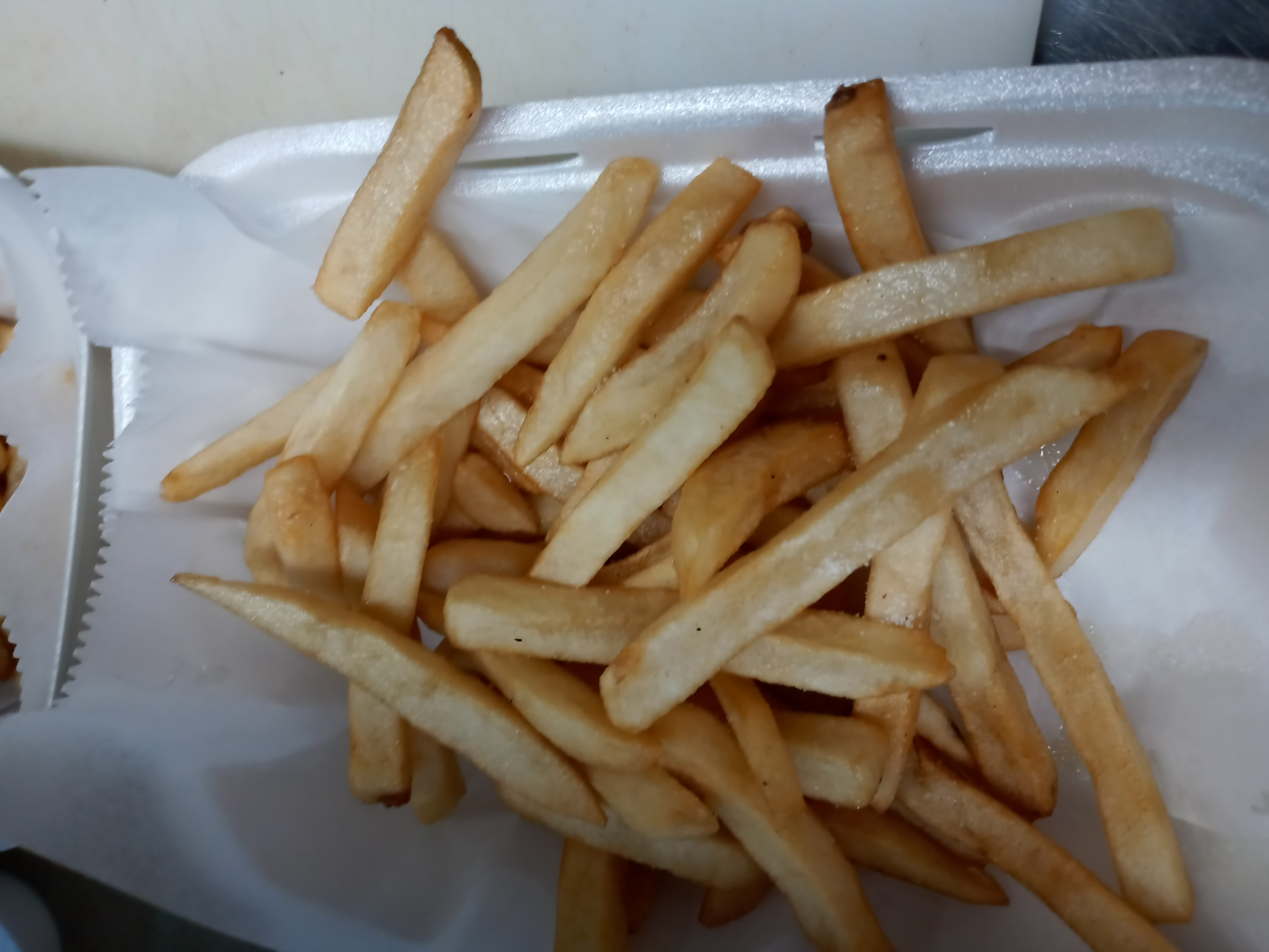 Order French Fries food online from Village Pizza store, Chicago on bringmethat.com
