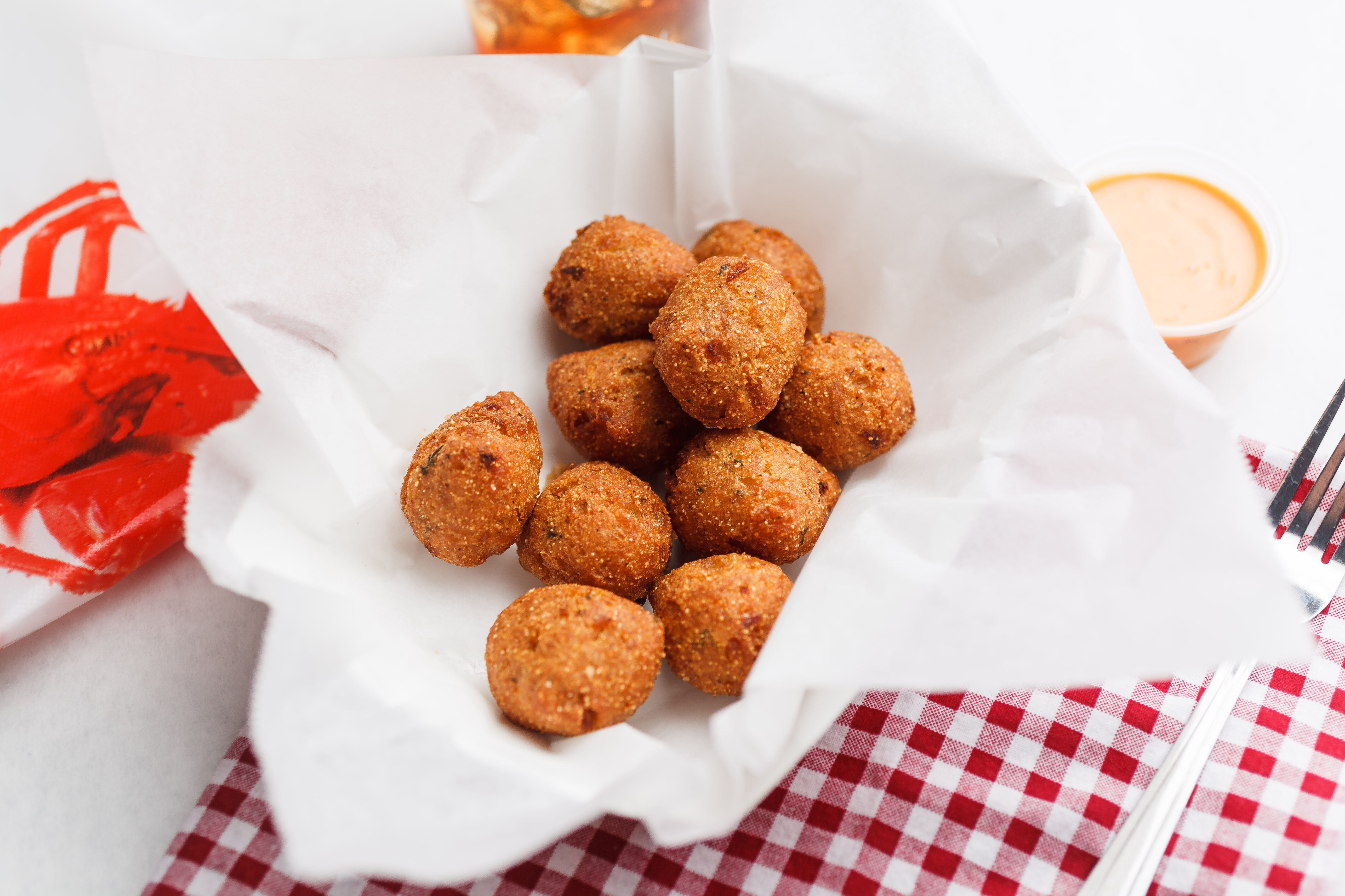 Order Hush Puppies food online from The Seafood King store, Hoover on bringmethat.com