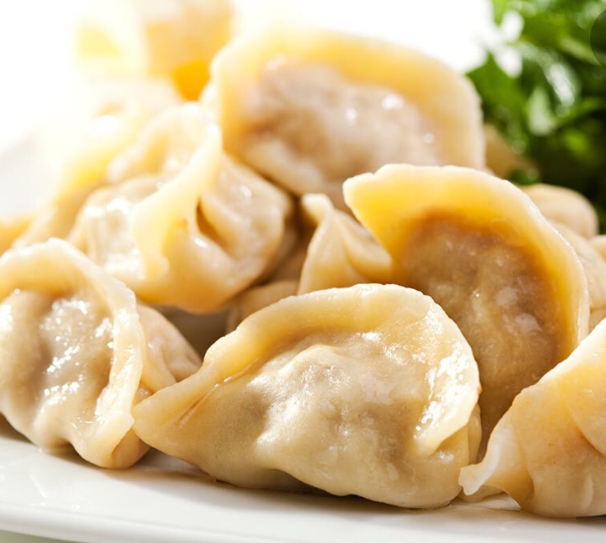 Order  Pork Dumplings  food online from Komo asian cuisine store, Bellmore on bringmethat.com