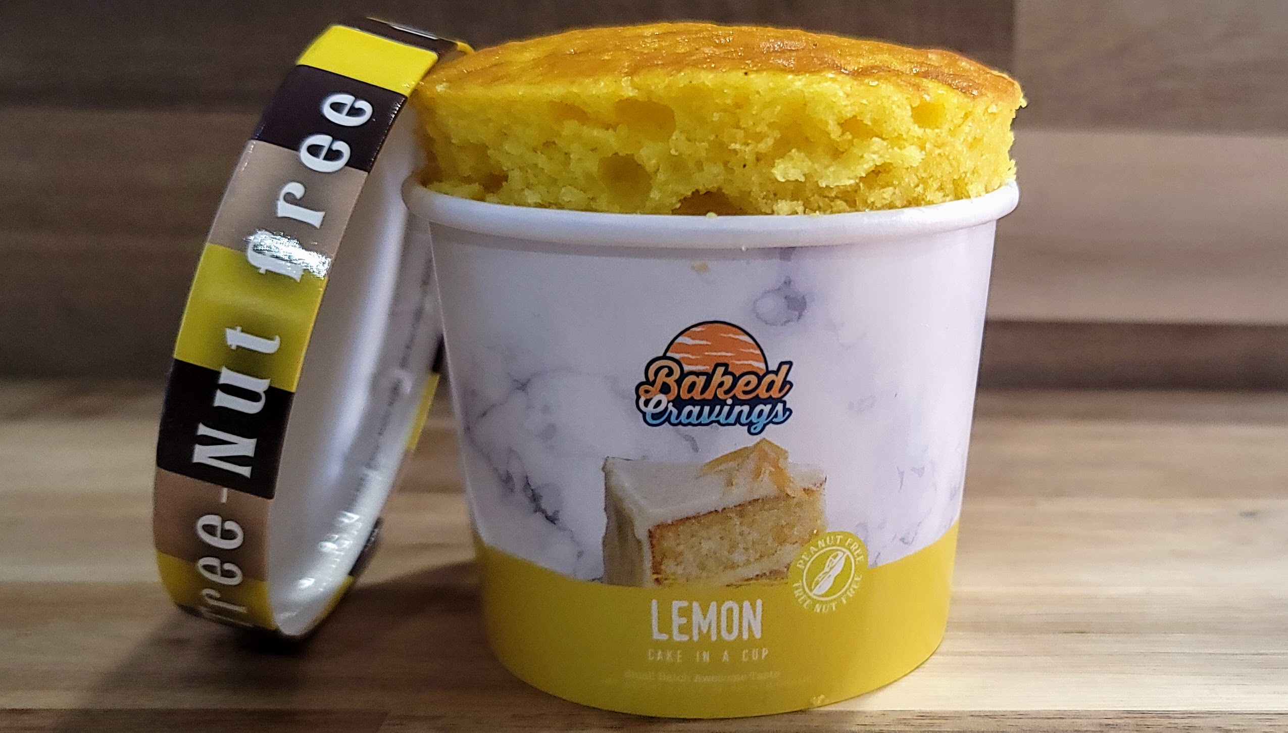 Order Lemon Cupcake in Cup 8oz food online from Baked Cravings store, New York on bringmethat.com
