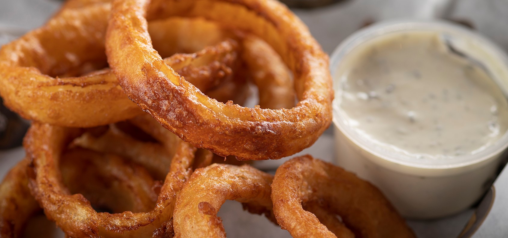 Order Onion Rings food online from Papa Saverio's Pizzeria store, Aurora on bringmethat.com