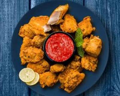 Order Golden Chicken Pakoras food online from Mad Over Curry store, Harrisburg on bringmethat.com